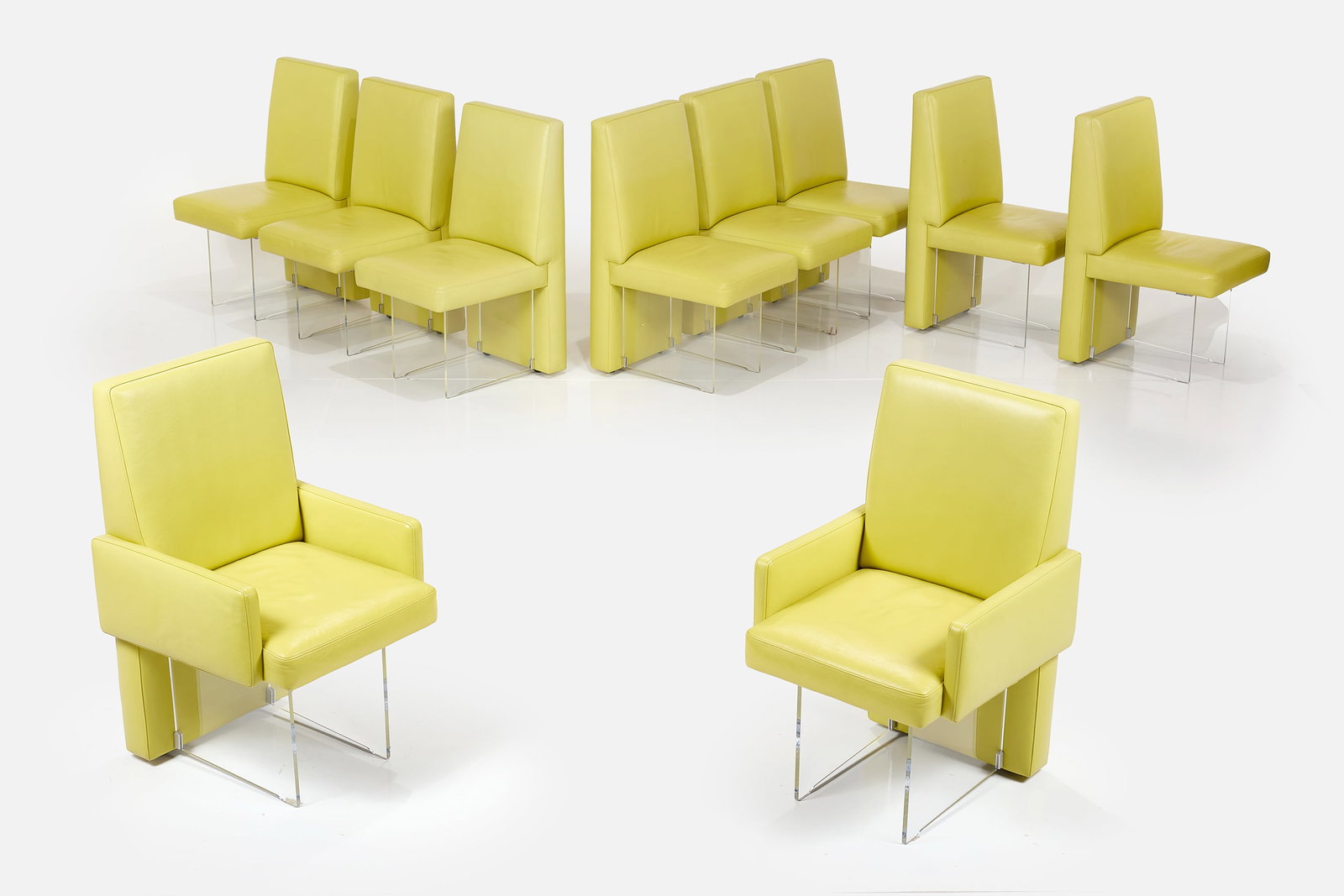 Vladimir Kagan, 'Clos' Dining Chairs (10): VLADIMIR KAGAN Set of 10 'Clos' dining chairs, ca. 1975 Lucite, vinyl upholstery, casters. Produced by Vladimir Kagan Designs, Inc., USA. Comprising two armchairs and eight side chairs. 