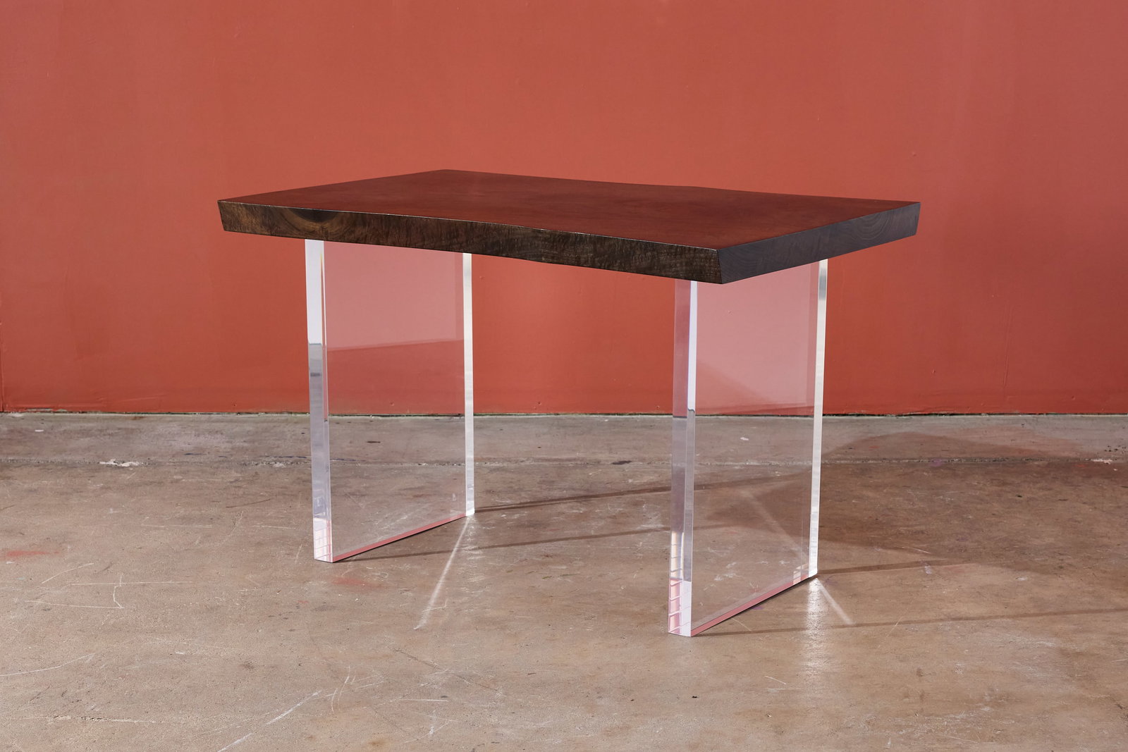Hudson, Live-Edge Desk: HUDSON Live-edge desk, 2012 Walnut, acrylic. Manufactured by Hudson Furniture, USA. Underside with manufacturer's brass label. 30.5" H x 48" W x 32" D 