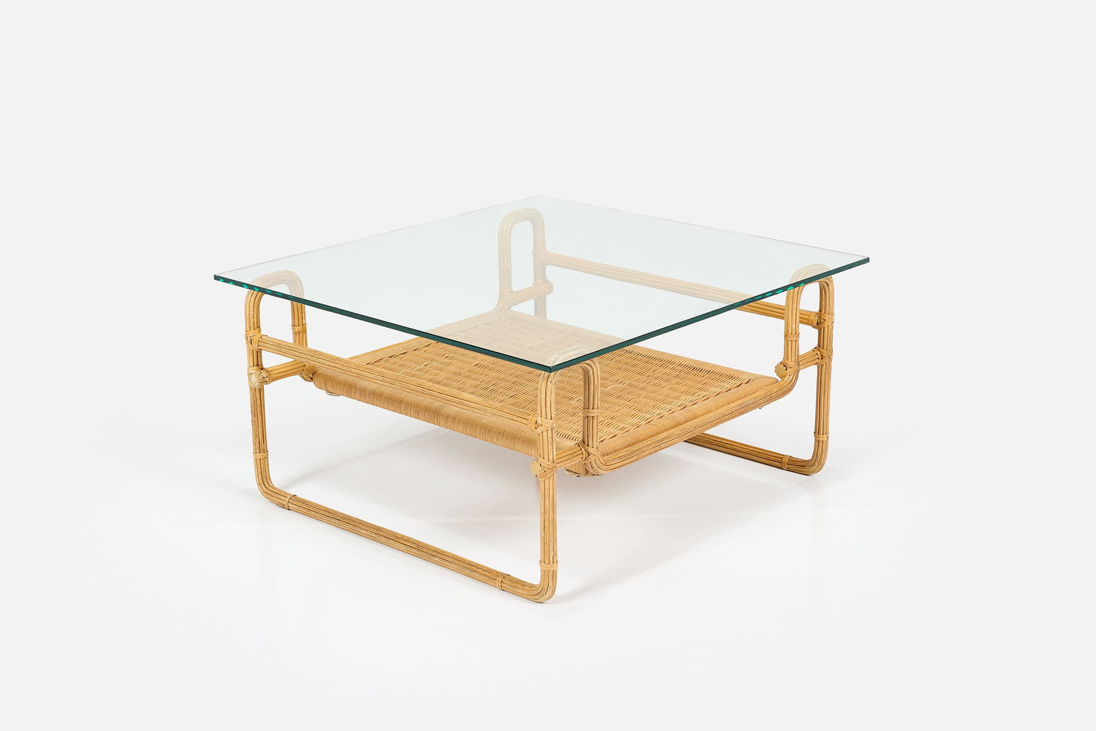 Marcel Breuer Style, Coffee Table: MARCEL BREUER STYLE Coffee table, late 20th century Wicker, glass. 15.5" H x 32" W x 31" D 
