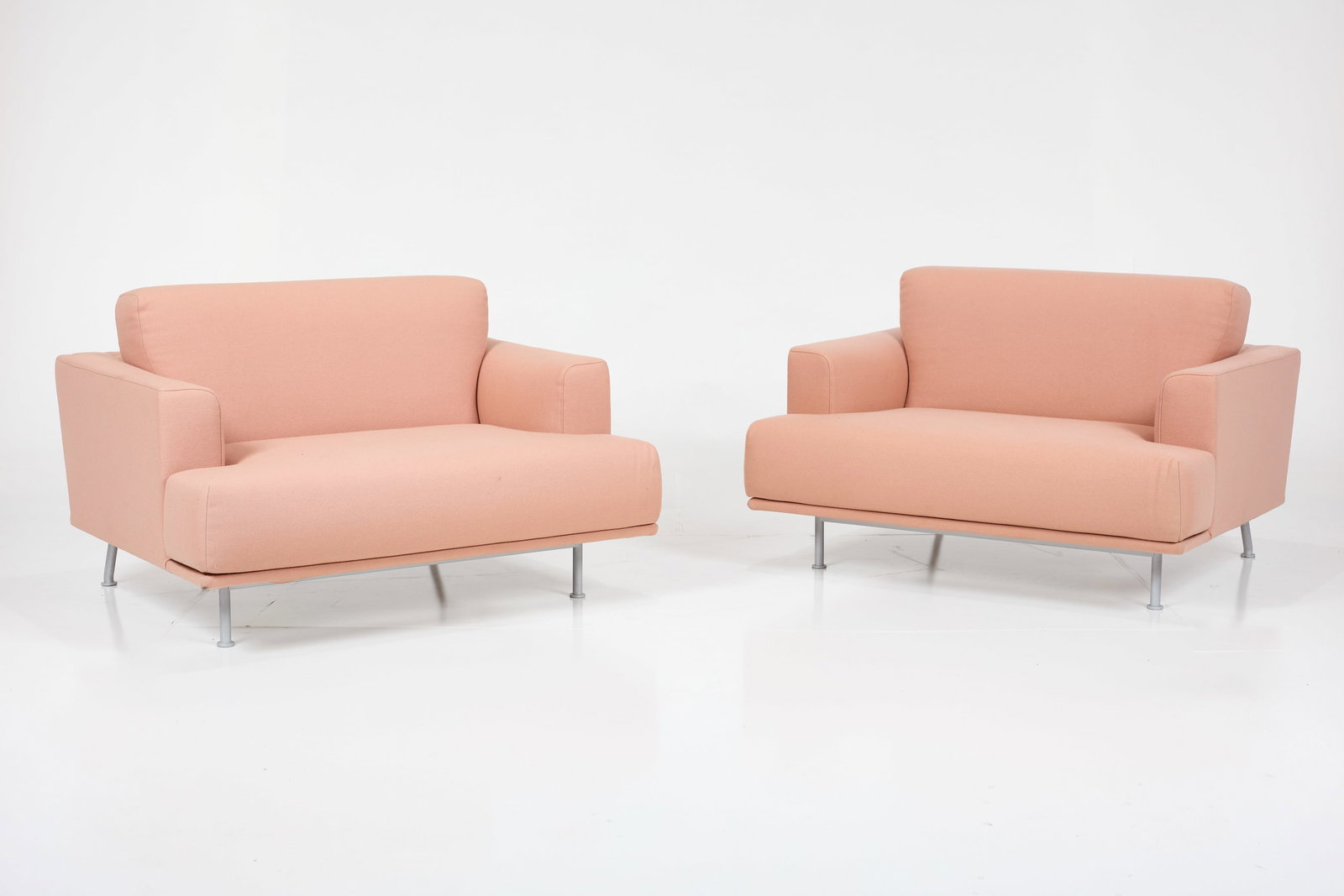 Piero Lissoni, '253 Nest' Lounge Chairs (2): PIERO LISSONI Pair of '253 Nest' chairs. 2000s Wool, powder-coated steel. Manufactured by Cassina, Italy. Manufacturer's branded decking. Each: 31" H x 47" W x 38" D