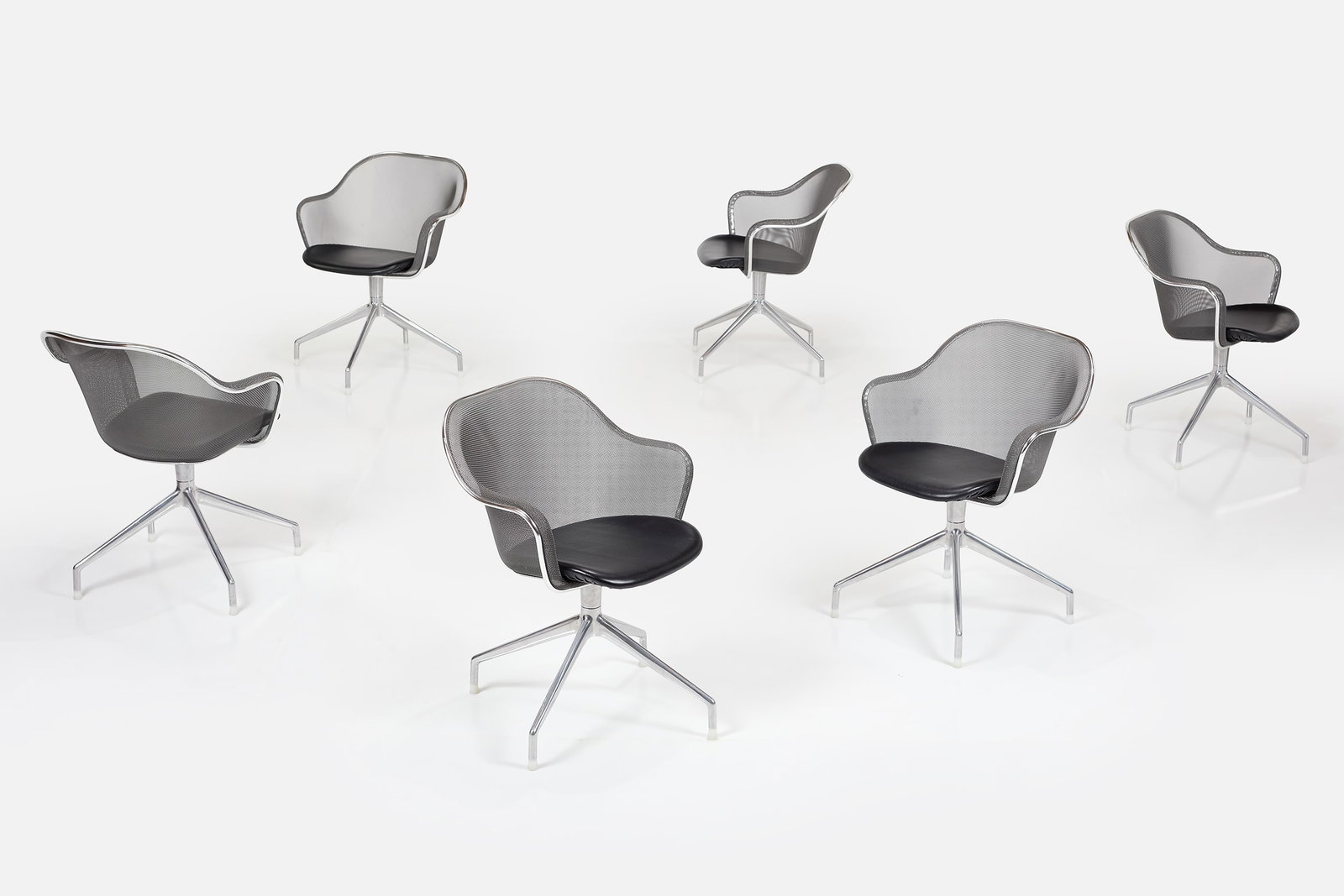 Antonio Citterio, 'Luta' Armchairs (6): ANTONIO CITTERIO Set of six 'Luta' armchairs, 2003 Pressed steel mesh. die-cast aluminum, leather. Manufactured by B&B Italia, Italy. Underside with manufacturer's molded mark and