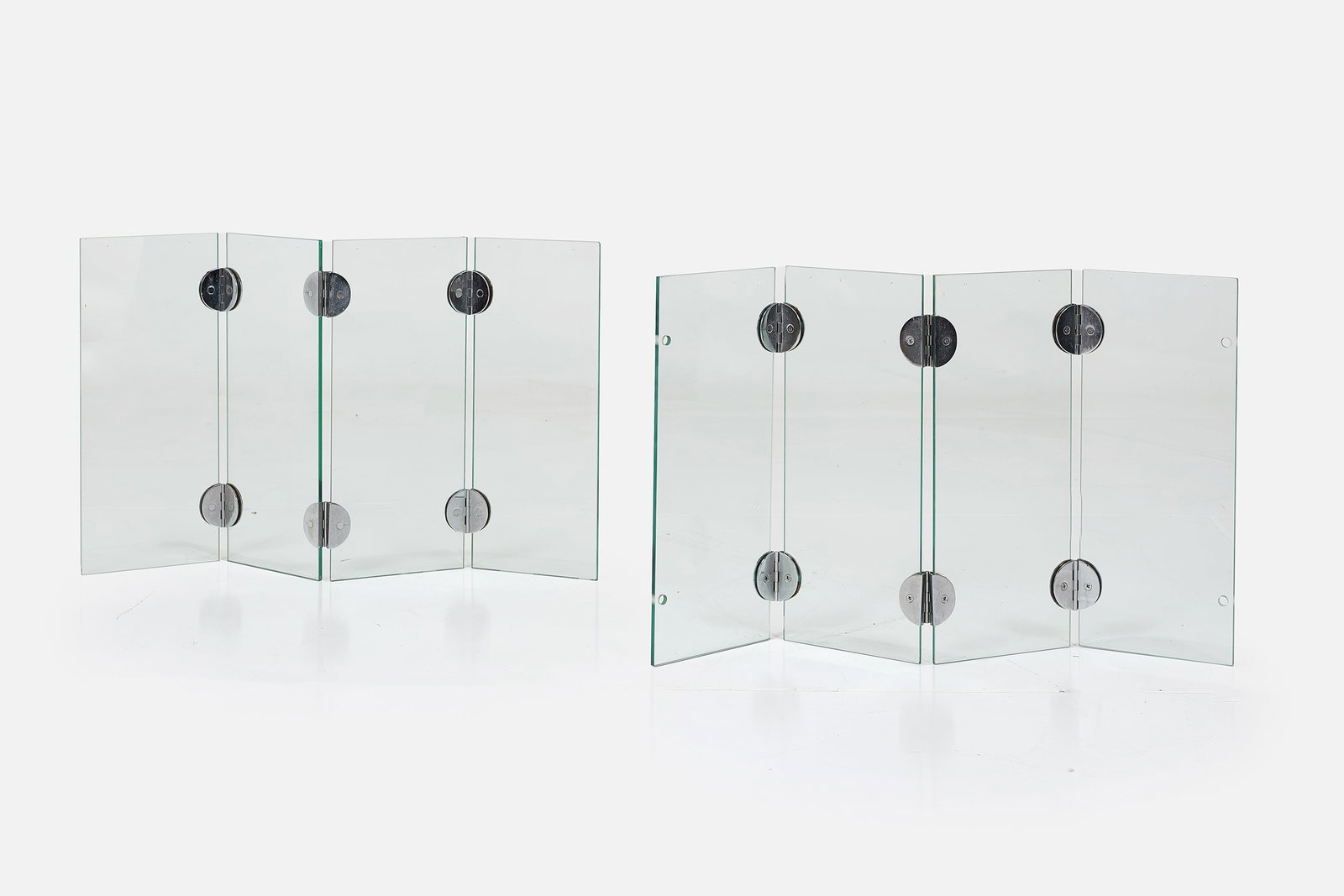 Modern, Fire Screens (2): MODERN Pair of fire screens, late 20th century Glass, chrome-plated metal. Each: 23.75" H x 40" W x 0.5" D 