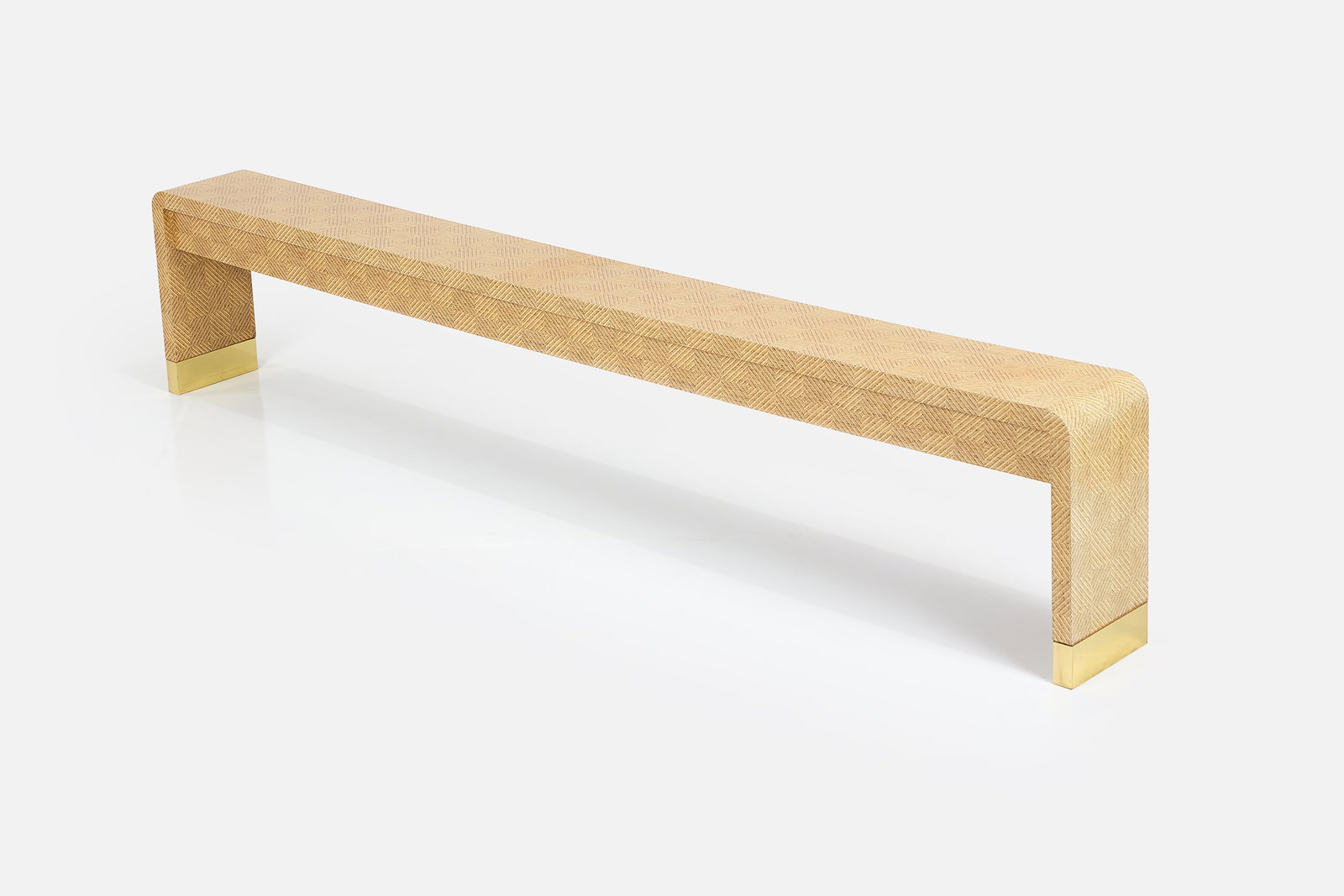 Karl Springer, Long Console Table: KARL SPRINGER Long console table, 1980s Lacquered grasscloth, brass, painted wood. Produced in the USA. 25" H x 125" W x 12" D 