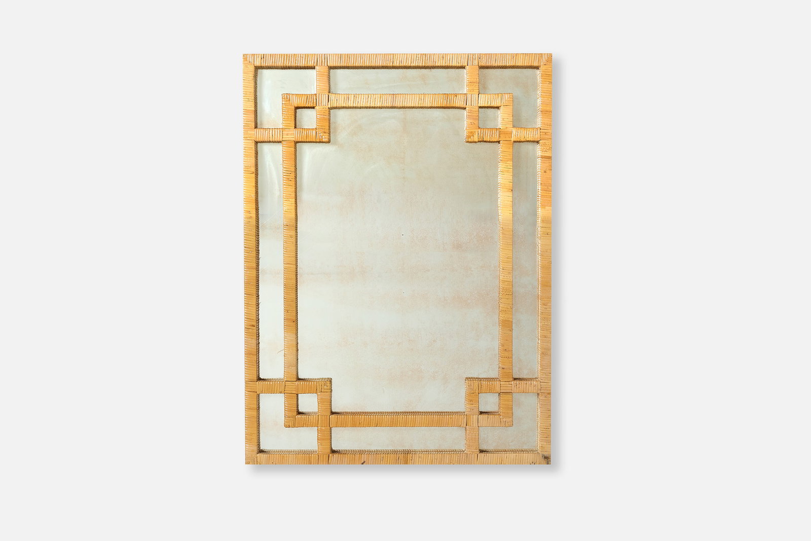 Modern, Raffia Mirror: MODERNIST Mirror, 1970s Raffia wrapped wood, mirrored glass. 36" H x 24" W x 1.75" D 