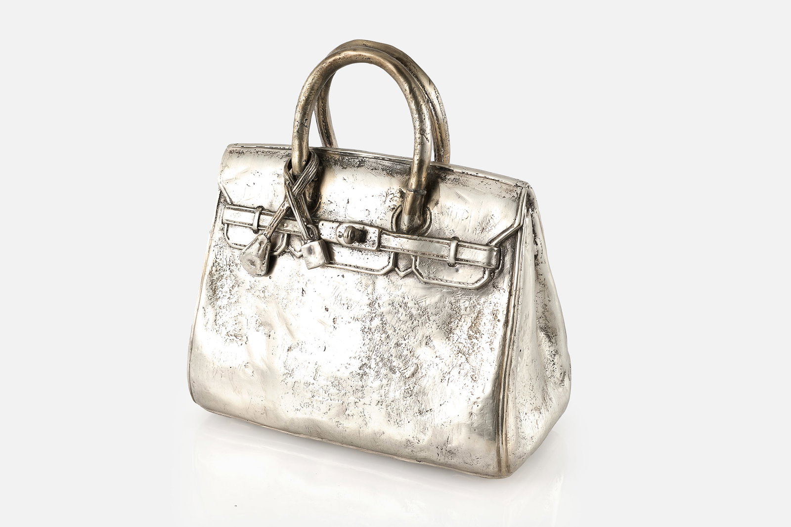 Christian Maas, Untitled 'Hermes Birkin Bag' Sculpture: CHRISTIAN MAAS Untitled 'Hermas Birkin bag' sculpture, 1990 Silvered bronze. 11" H x 10" W x 6" D