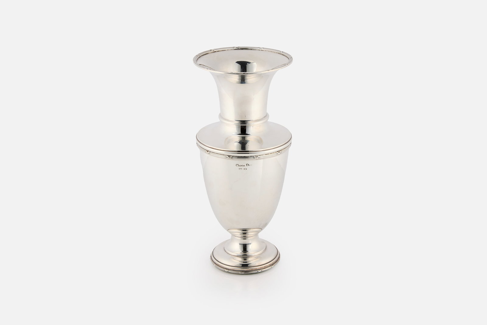 Christian Dior, Neoclassical Style Vase: CHRISTIAN DIOR Neoclassical style vase, 1980s Silverplate. Produced in France. Impressed "Christian Dior" and with silver hallmarks. 11.25" H x 5" Diameter 