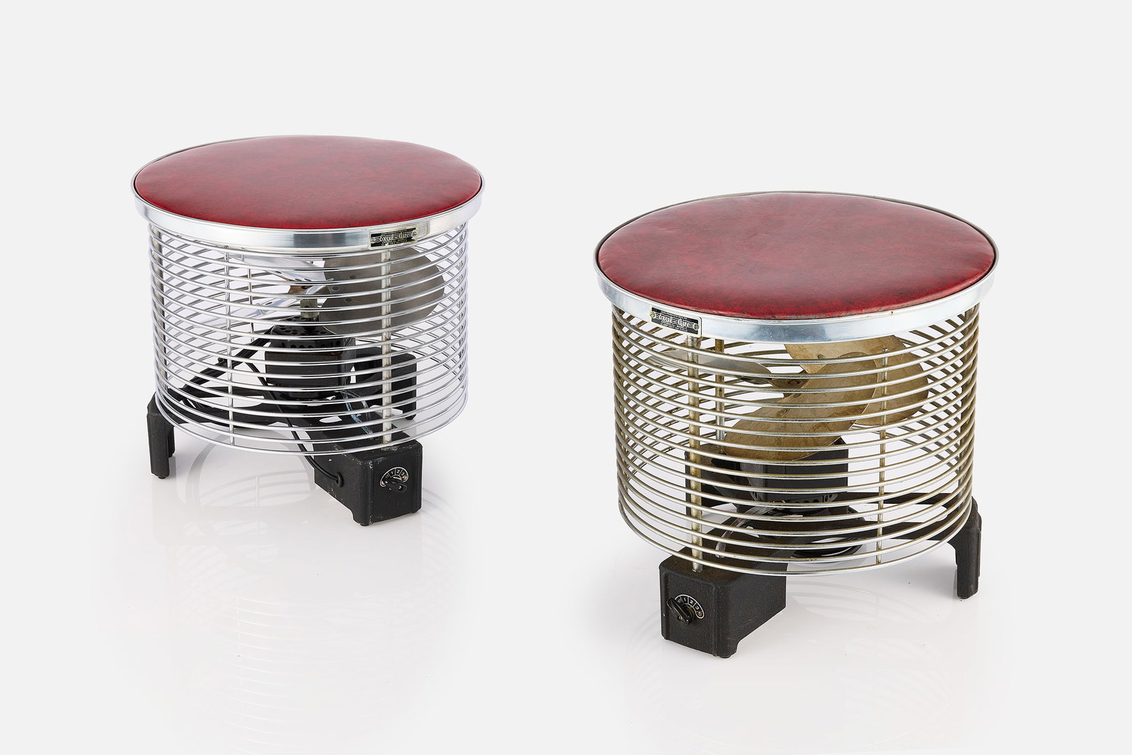 Excel-Aire, Hassock Fans (2): EXCEL-AIRE Pair of hassock fans, 1950s Steel, cast aluminum, vinyl. Produced by All-American Mfg. Co., Chicago, IL. 14" H x 15" Diameter 