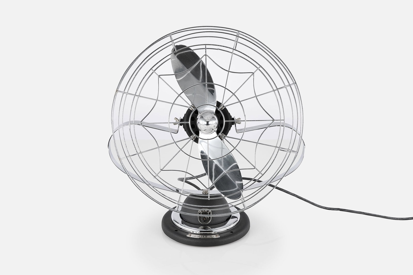 Bersted, 'Eskimo' Air Circulator: BERSTED 'Eskimo' air circulator with 'King Cobweb' cage design, 1940s Steel, cast aluminum. Produced by Bersted, Fostoria, OH. 22" H x 20" W x 9" D 