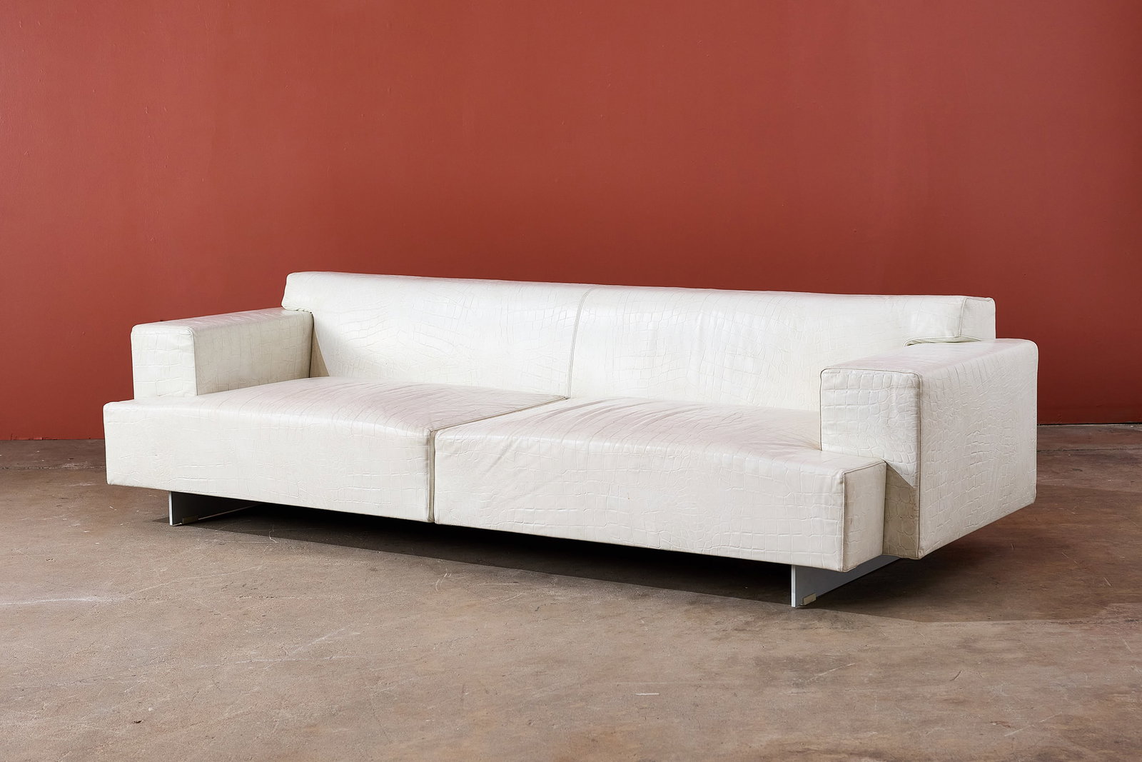 Jasper Morrison, Sofa: JASPER MORRISON Sofa,2000s Embossed Edelman leather, lacquered metal. 26.5" H x 98" W x 38" D Seat height: 13.5" 