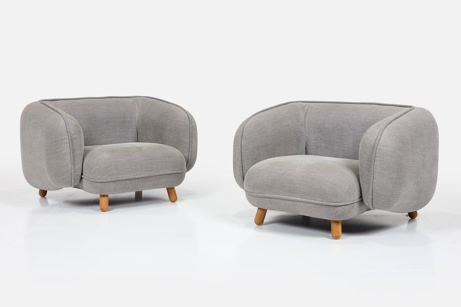 Iskos-Berlin, 'Basset' Lounge Chairs (2): ISKOS-BERLIN Pair of 'Basset' lounge chairs, 2010s Fabric, beech. Manufactured by Iskos-Berlin, Denmark. Each: 29" H x 44" W x 39" D Seat height: 16" 