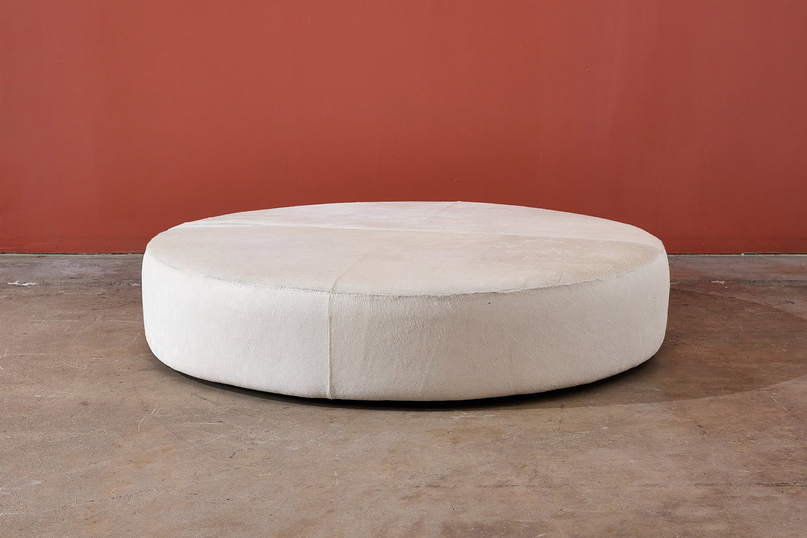 Antonio Citterio, Large 'Henry' Ottoman: ANTONIO CITTERIO Large 'Henry' ottoman, 2014 Hide, foam. Manufactured by B&B Italia, Italy. Underside with manufacturer's branded decking and label. 12" H x 60"