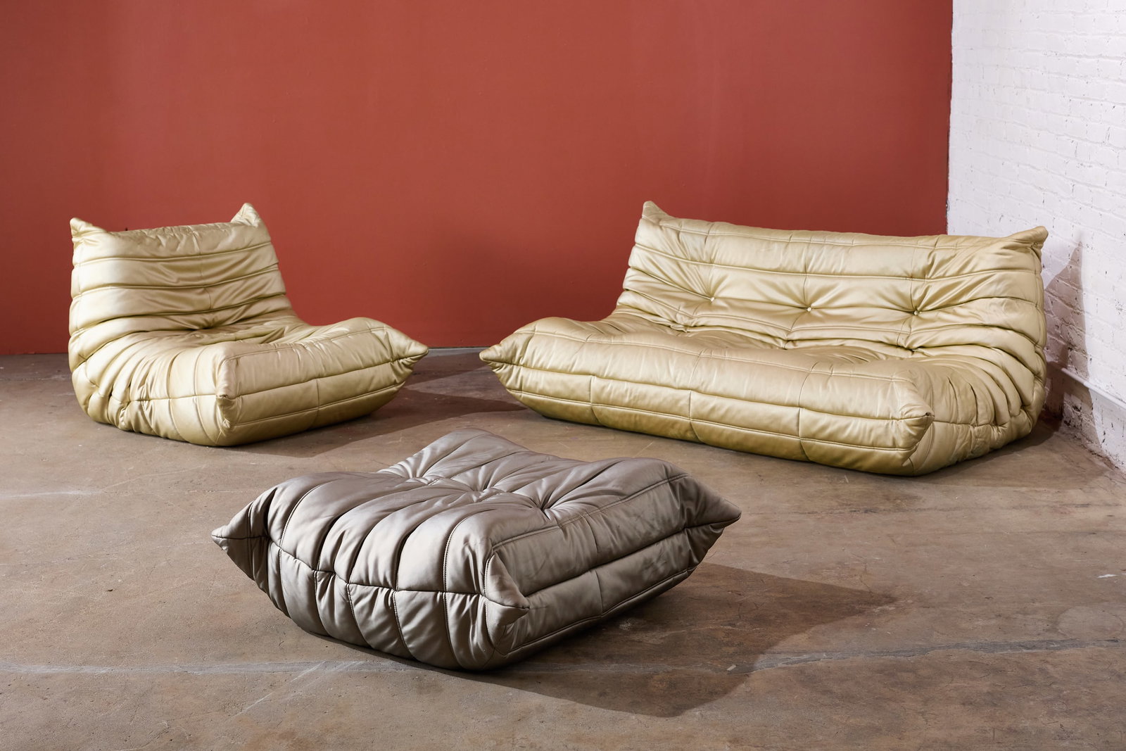 Michel Ducaroy, 'Togo' Sectional (3): MICHEL DUCAROY Three-part 'Togo' sectional sofa, 2008 Vinyl, foam. Manufactured by Ligne Roset, France. Undersides with manufacturer's branded decking. Comprising one two-seater,