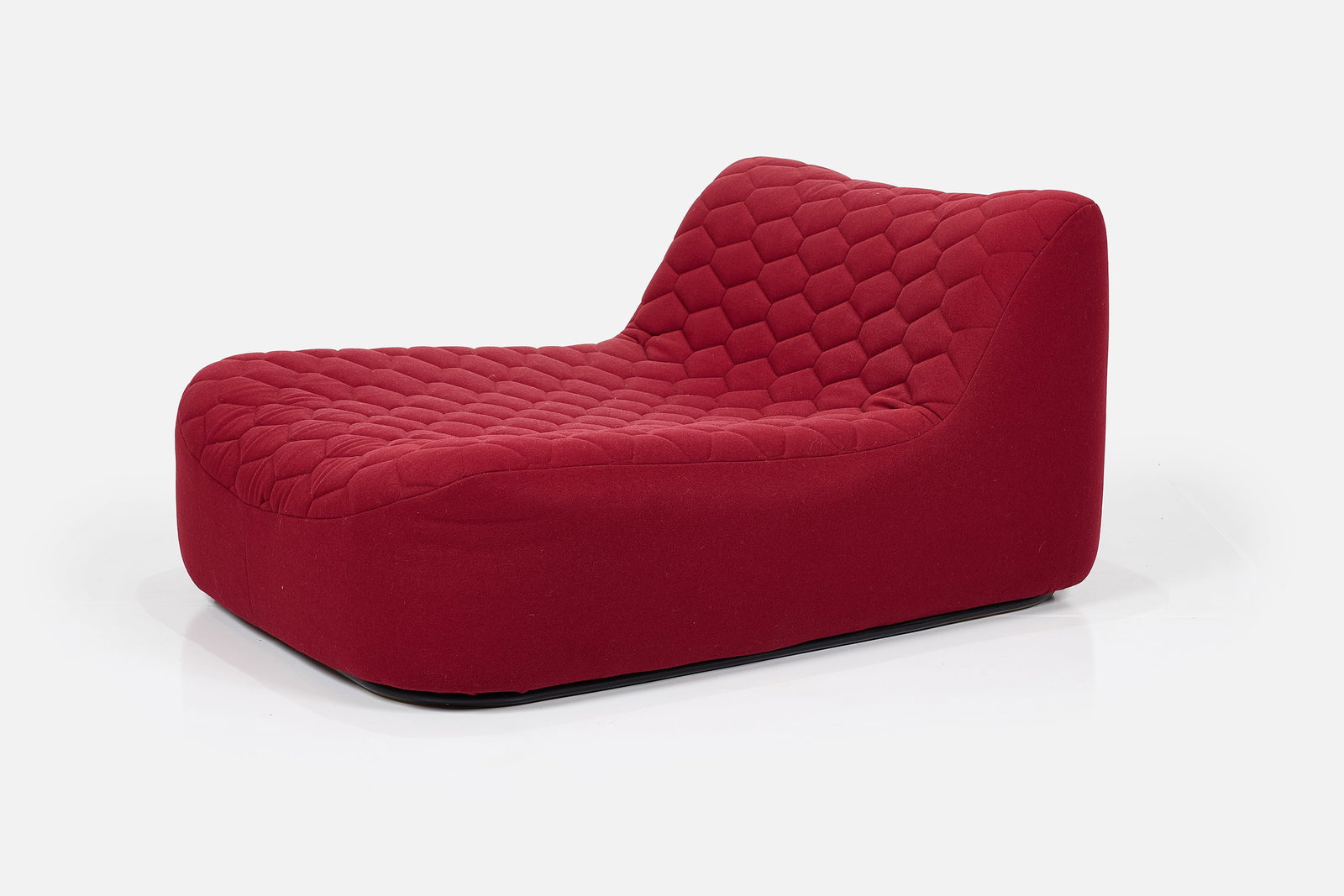 Tom Dixon, 'Slouch' Chaise Lounge: TOM DIXON 'Slouch' chaise lounge, ca. 2010 Fabric, stained wood. Produced by Tom Dixon Studio, UK. Producer's seam tag along the back. 31" H x 44" W x 55" D 