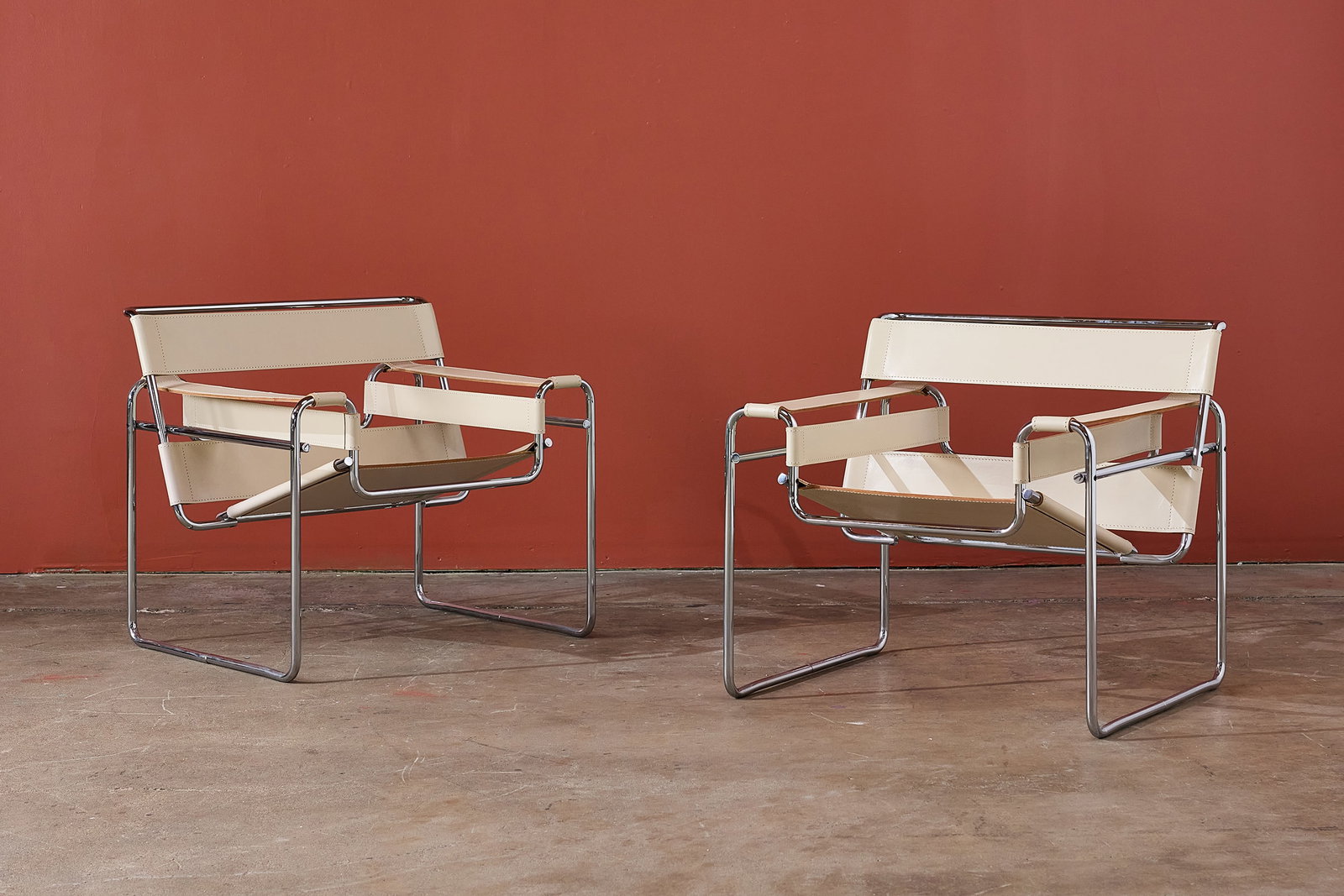 Marcel Breuer, 'Wassily' Chairs (2): MARCEL BREUER Pair of 'Wassily' lounge chairs, 1990s Chrome-plated tubular steel, leather. Manufactured by Knoll, USA. Frames impressed "KnollStudio" and with facsimile signature.