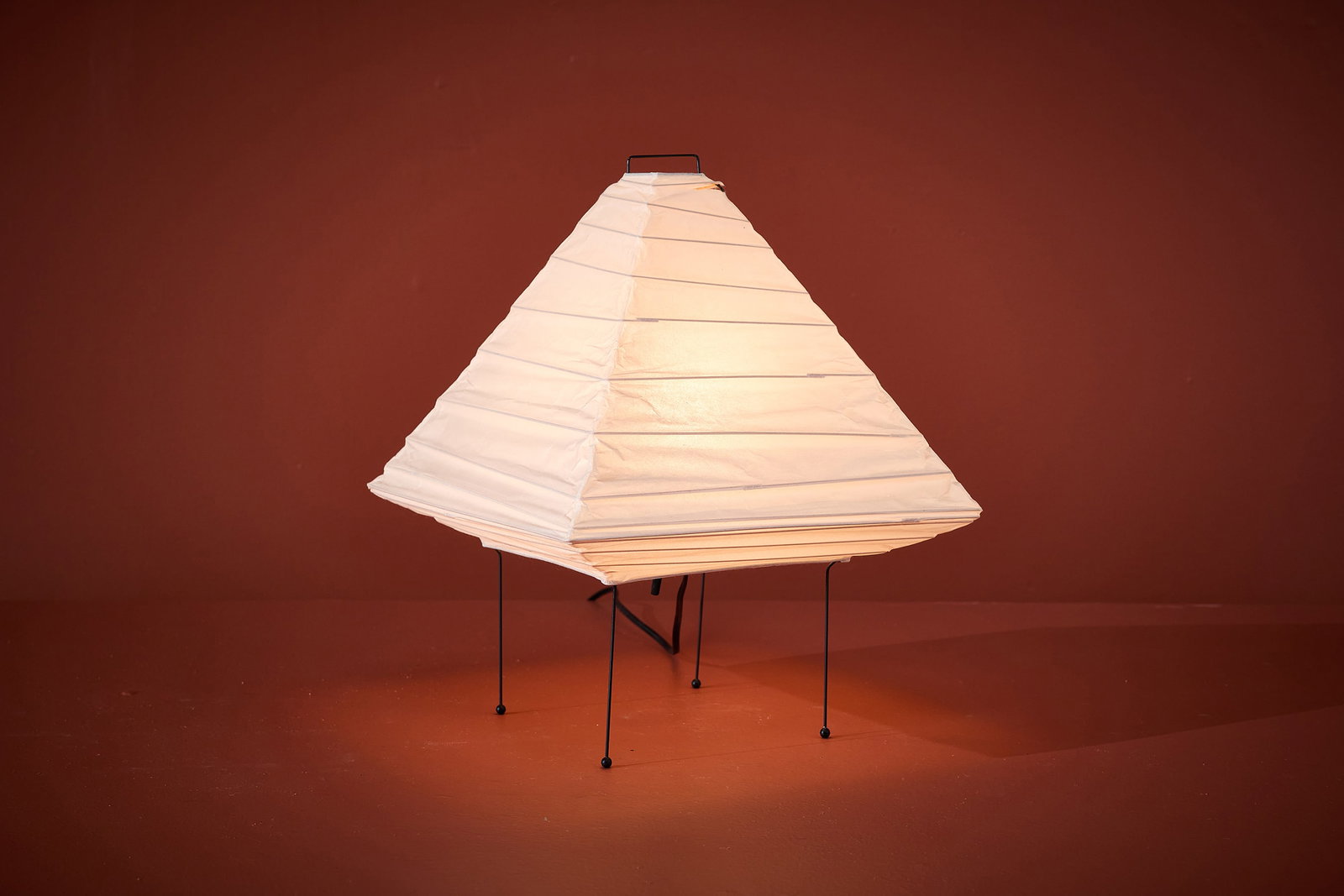 Isamu Noguchi, 'Akari' Table Lamp: ISAMU NOGUCHI 'Akari' table lamp, model no. 5X Paper, bamboo, painted metal. Produced by Ozeki, Japan. Shade with artist's cipher and signature. 15" H x 12" W x 12"