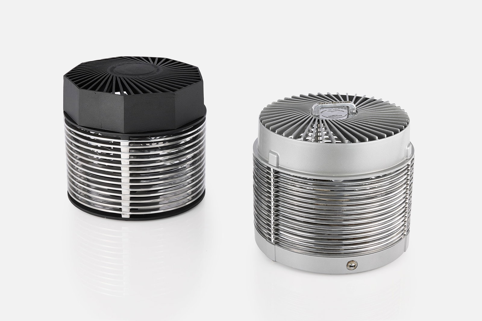 J. T. Roffy, Machine Age Hassock Fans (2): J. T. ROFFY Two hassock fans, 1930s + 1946 Aluminum, steel. Produced by MotionAire, Los Angeles, CA. 13" h x 13" Diameter