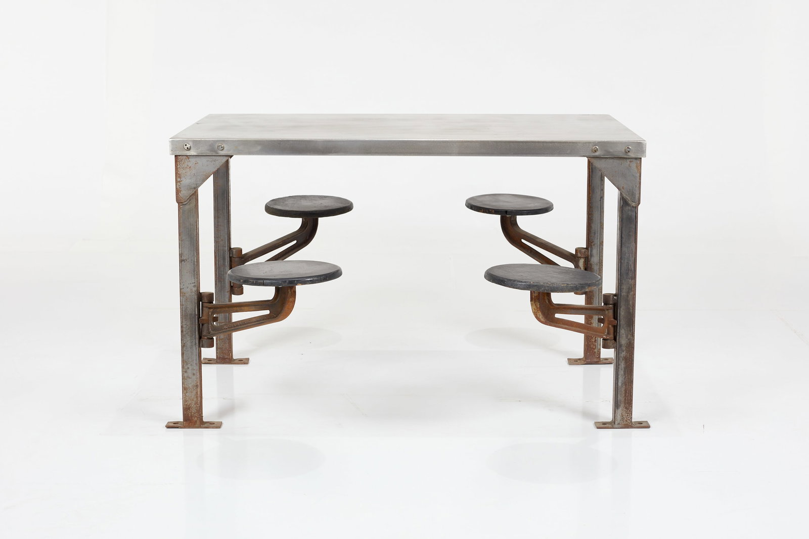 Industrial, Swing-Out Seat Table: INDUSTRIAL Swing-out seat table, late-20th century Stainless steel, steel, painted wood. 32" H x 50.75" W x 57.5" D 