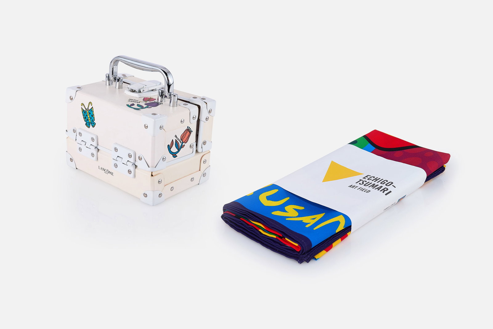 Yayoi Kusama, 'Tsumari in Bloom' Wrapping Cloth + Makeup Box (2): YAYOI KUSAMA 'Tsumari in Bloom' wrapping cloth, 2018 + Makeup box, 2010 Wrapping cloth: Print on polyester. From an unnumbered limited edition. Makeup box: For Lancome. Printed