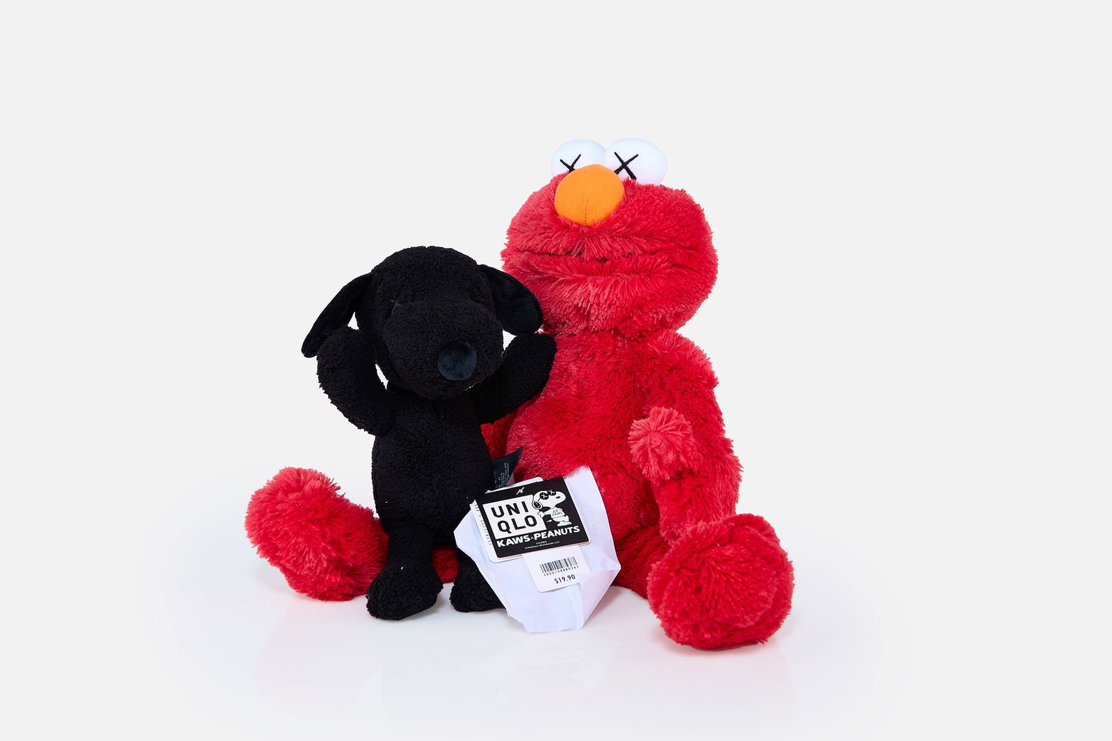 KAWS X Uniqlo, 'Snoopy' + 'Elmo' Plush Toys (2): KAWS (BRIAN DONNELLY) X UNIQLO 'Snoopy' and 'Elmo' plush toys, 2018 Polyester, faux fur, acrylic. Manufactured by Uniqlo, USA. Each with original hang tags. From an edition of