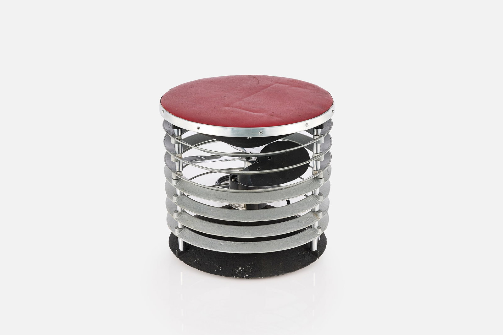 Machine Age, 'Pure Breez' Hassock Fan: MACHINE AGE 'Pure Breez' hassock fan model no. A-5, 1946 Cast steel, wrinkle finish steel, aluminum, leatherette. Produced by All-American Mfg Co., Chicago, IL. 14" x 14.5" Diameter