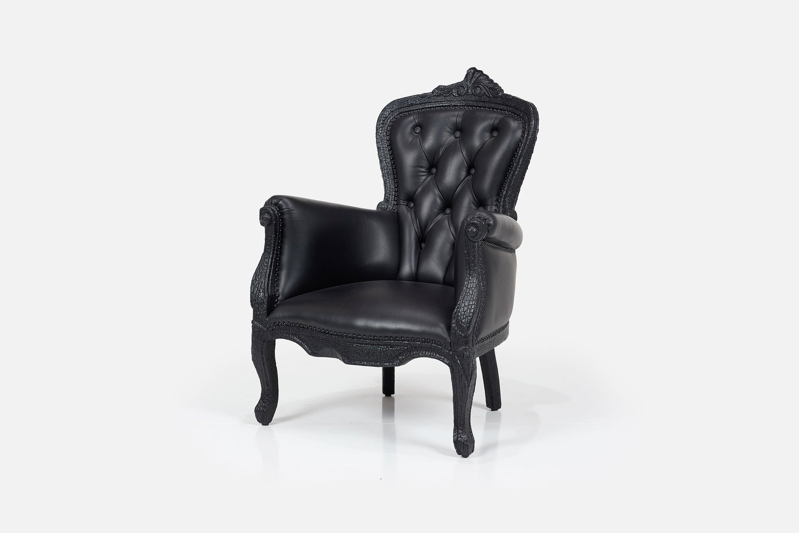 Maarten Baas, 'Where There's Smoke' Chair: MAARTEN BAAS 'Where There's Smoke' chair, Charred wood, leather. Manufactured by Moooi, The Netherlands. Metal manufacturer's label to the underside 'Moooi Smoke