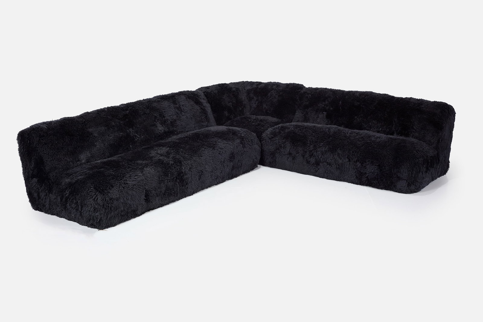 Timothy Oulton, 'Yeti' Sectional Sofa (3): TIMOTHY OULTON Three-piece 'Yeti' sectional sofa, 2020 Shearling wool. Manufactured by Restoration Hardware, USA. Underside with manufacturer's labels. Overall: 32" H x