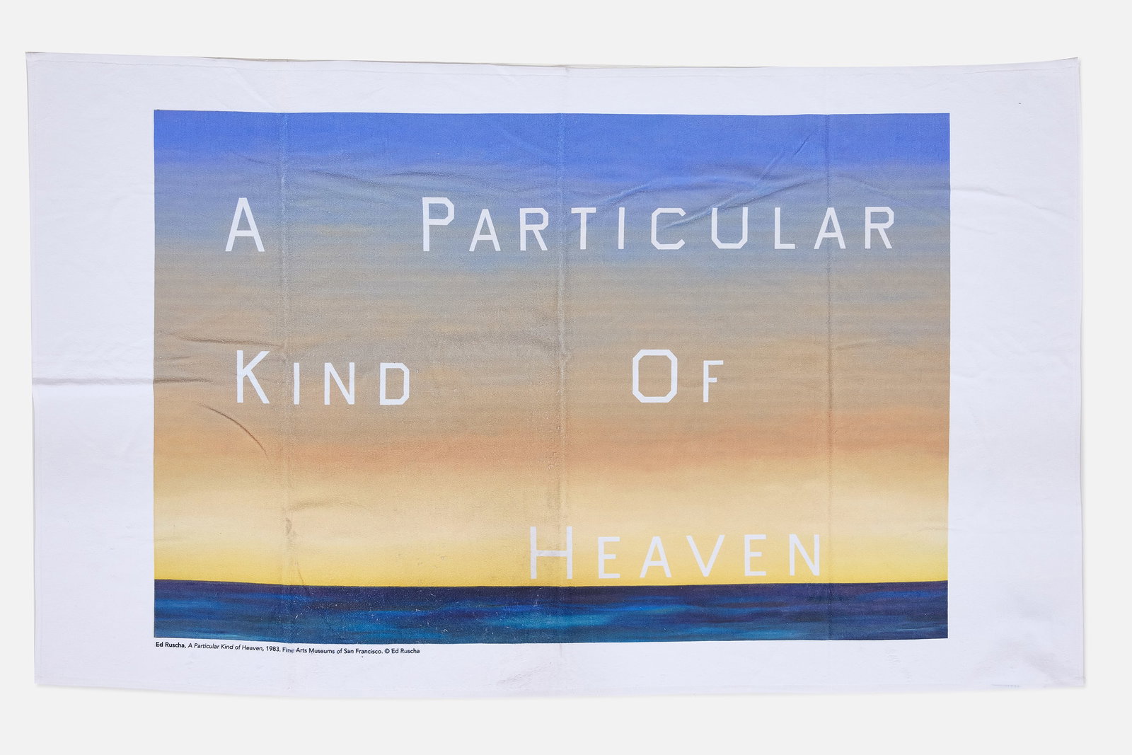 Ed Ruscha, 'A Particular Heaven' Towel: ED RUSCHA 'A Particular Heaven' towel, ca. 2000 Printed cotton. Published by Fine Arts Museums of San Francisco, CA. 36" x 59.5" 
