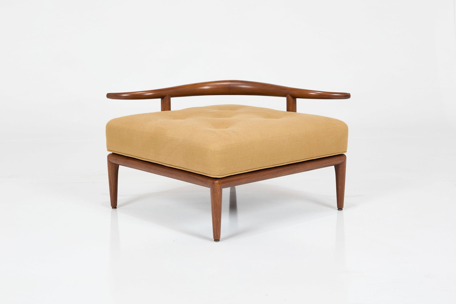 Maurice Bailey, 'Horn' Ottoman: MAURICE BAILEY 'Horn' ottoman, 1960s Walnut, linen, leather, brass. Manufactured by Monteverdi-Young, USA. 21" H x 35" W x 35" D 