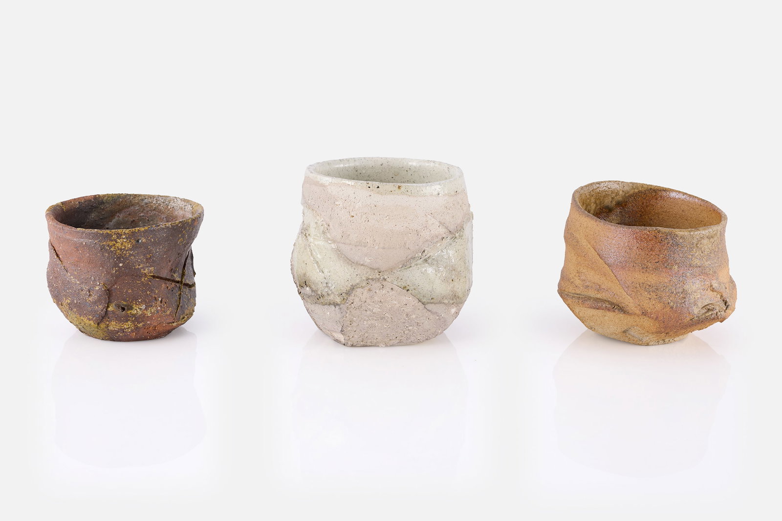 Paul Soldner, Tea Bowls (3): PAUL SOLDNER Set of three tea bowls, ca. 2006 Glazed stoneware. Each with artist's cipher. Largest: 5.25" H x 6" Diameter 