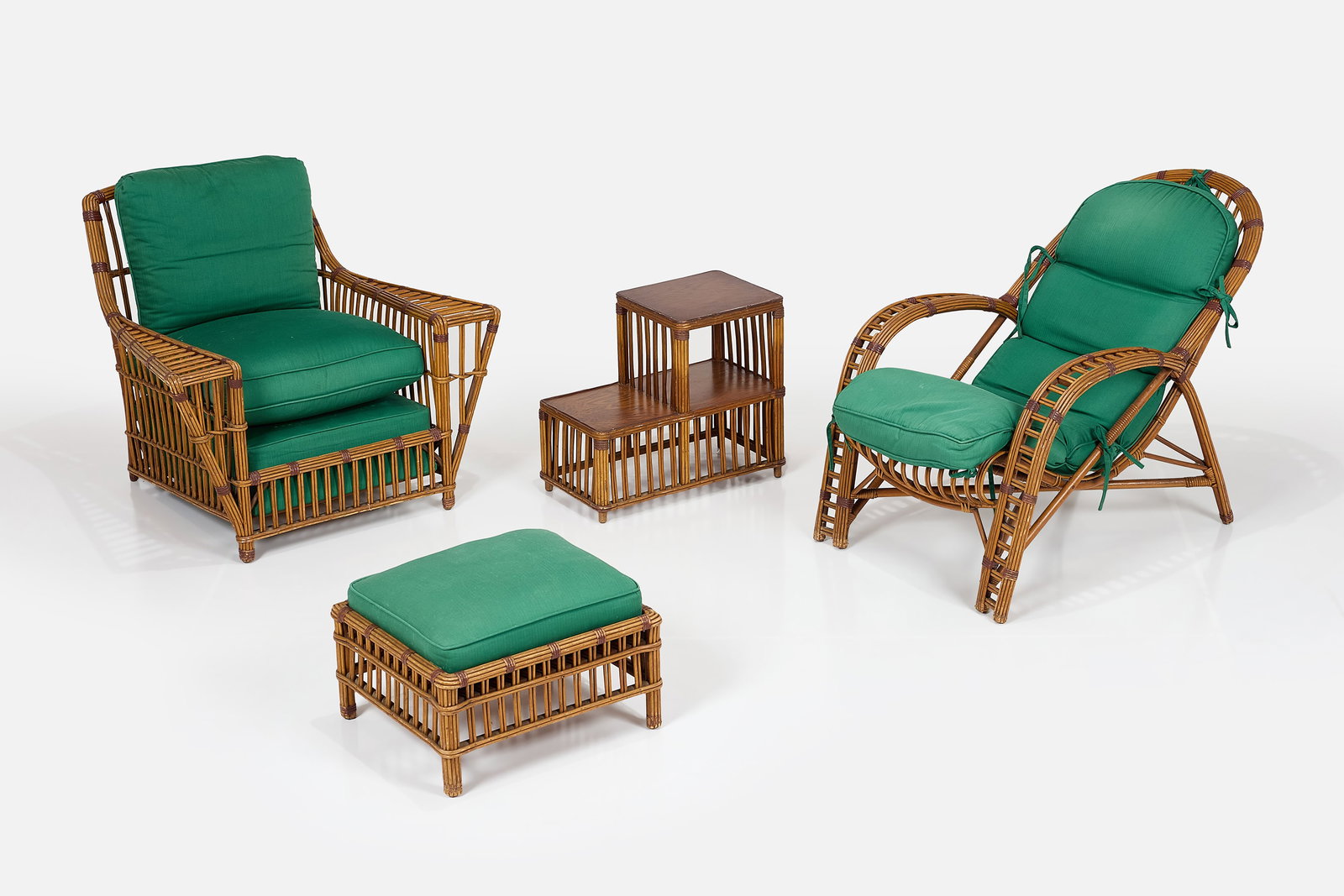 Modern, Patio Seating Set (4): MODERN Seating set, comprising two armchairs, one side table and one ottoman, 1940s Rattan, plywood, fabric. Produced by Veal Reed Chair Co., Los Angeles, CA. Larger chair: 33.75" H x 29&q