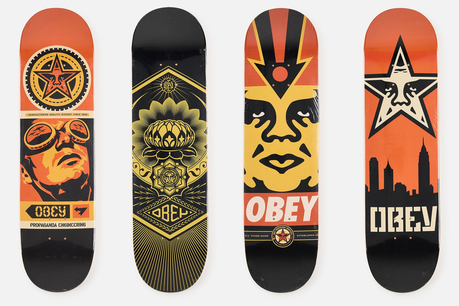 Shepard Fairey, 'Obey' Skate Decks (4): SHEPARD FAIREY Set of four 'Obey' skate decks, 21st century Offset lithographs in colors on skate decks. Each: 31.5" H × 8" W ×