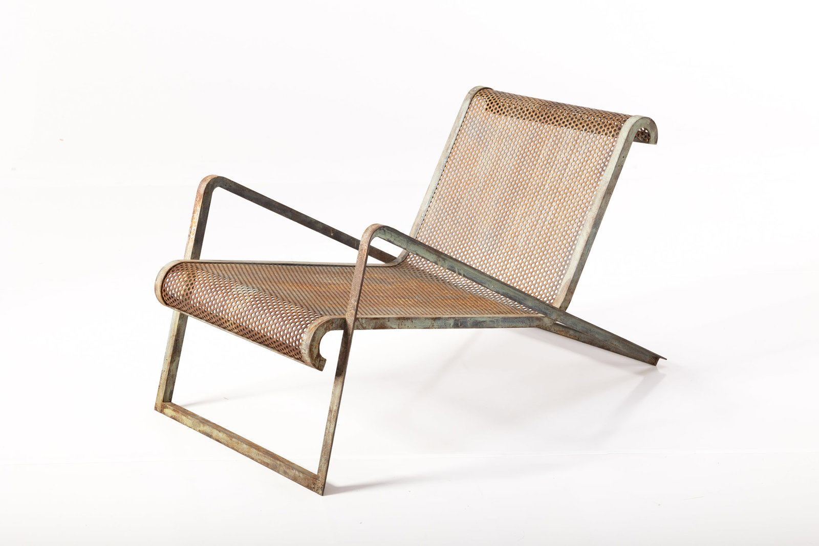 Jean Royere Style, 'Z' Chair: JEAN ROYERE STYLE 'Z' lounge chair, mid-20th century Painted steel, painted perforated steel. 24.25" H x 23.25" W x 43" D Seat height: 14" 