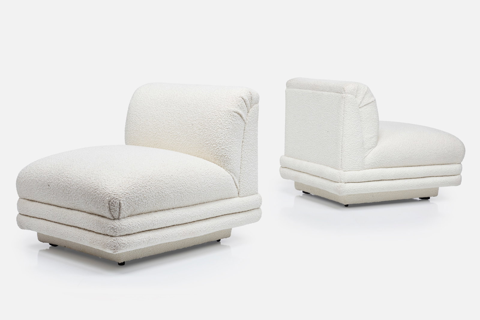 Postmodern, Armless Chairs (2): POSTMODERN Pair of armless lounge chairs, 1980s Boucle. Each: 28.25" H x 27" W x 34" D Seat height: 16"