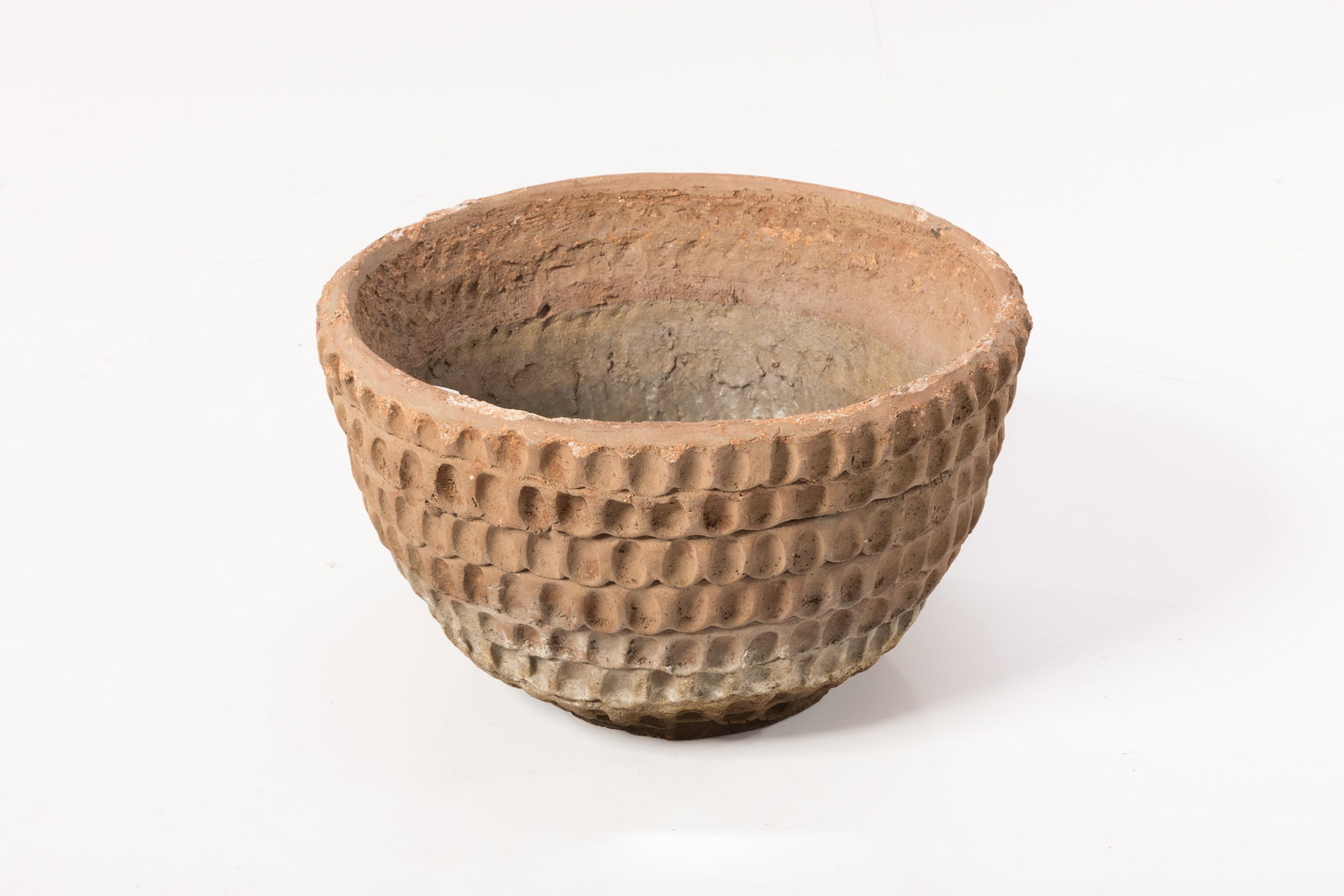 Stan Bitters, 'Thumb' Pot: STAN BITTERS Thumb pot Unglazed stoneware. Produced by Hans Sumpf, Fresno. Interior stamped with "Hans Sumpf" and "A-21". 13" H x 21" Diameter
