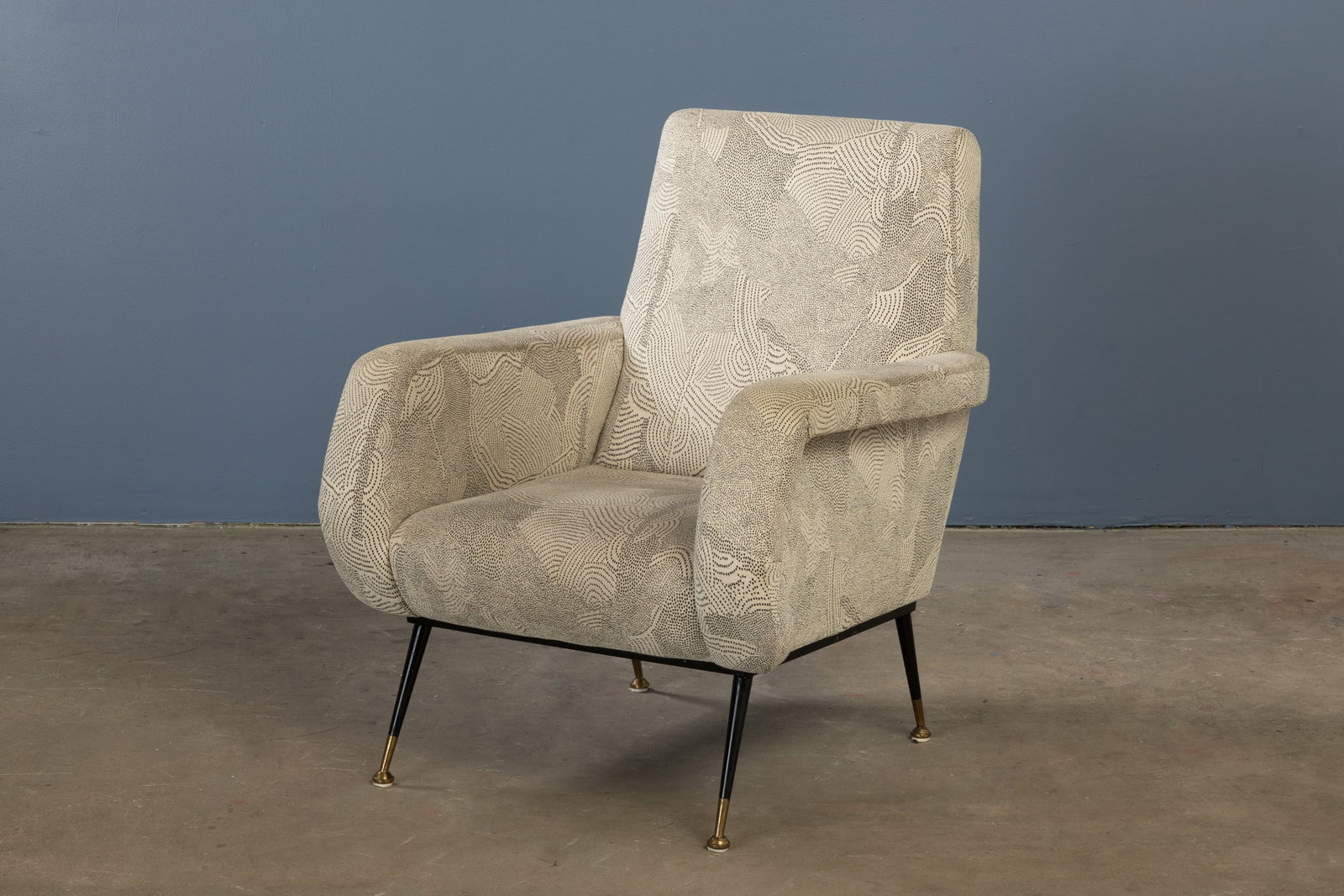 Italian, Lounge Chair: ITALIAN Lounge chair, 1950s Pierre Frey fabric, lacquered metal, brass. 35" H x 28" W x 32" D Seat height: 16" 