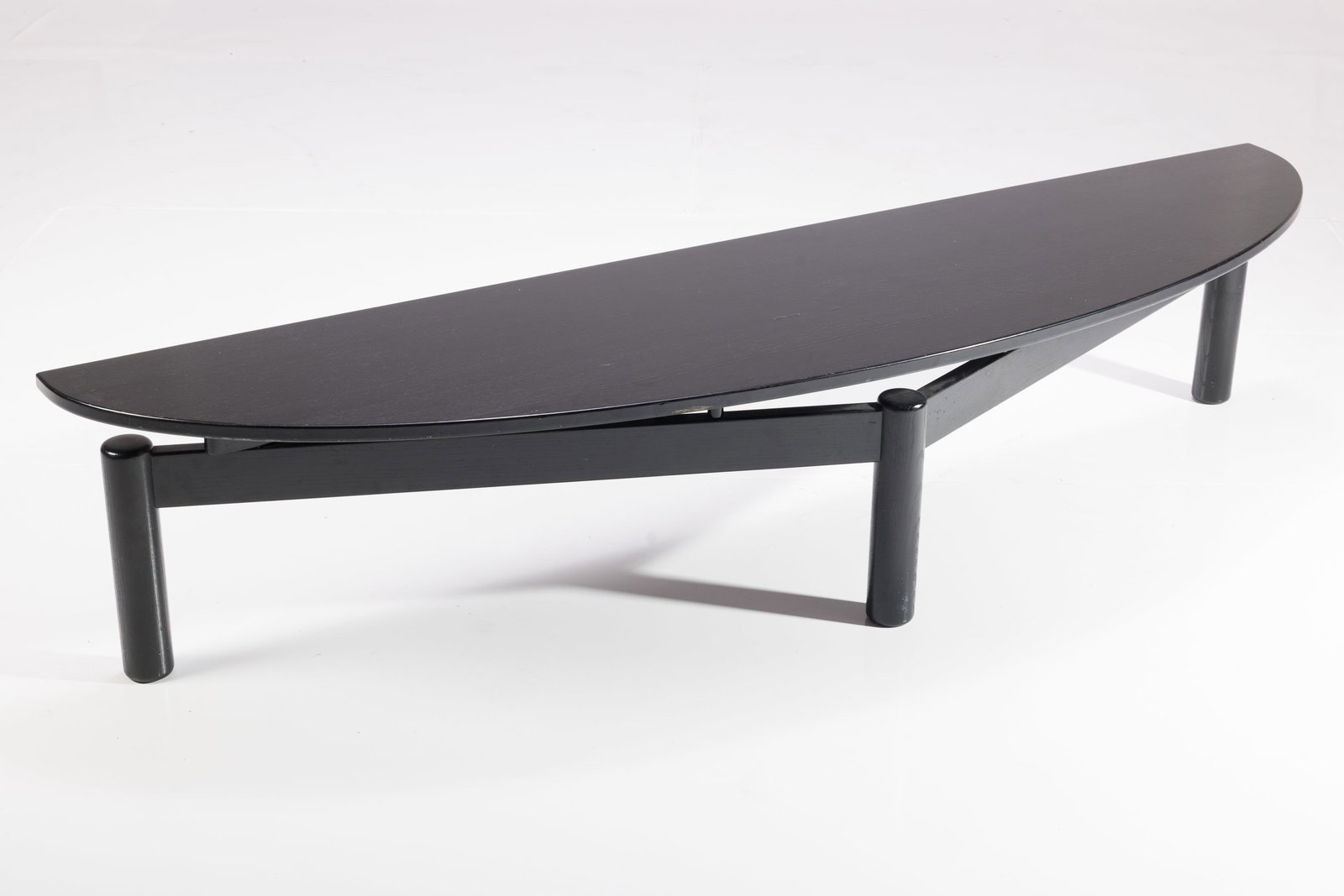 Vico Magistretti, 'Sinbad' Coffee Table: VICO MAGISTRETTI 'Sinbad' coffee table, 1980s Ebonized wood, metal. Manufactured by Cassina, Italy. Underside with manufacturer's label and impressed "05D". 15" H x
