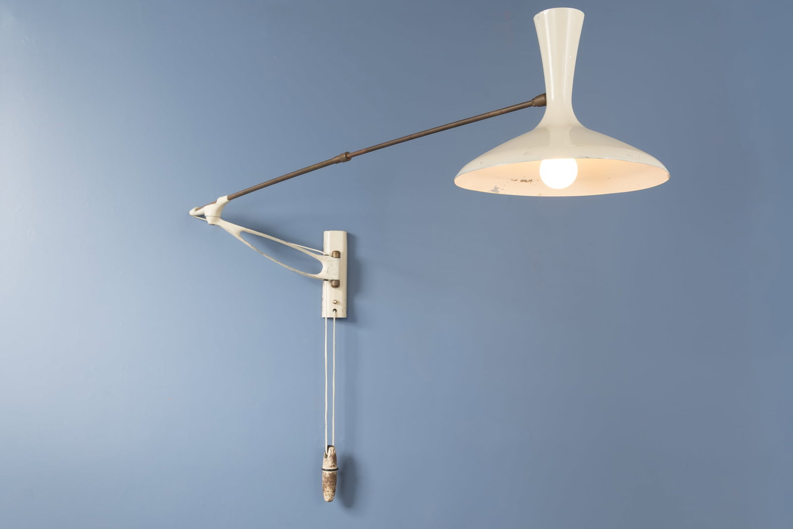 Louis Kalff, Articulating Wall Lamp: LOUIS KALFF Articulating wall light, 1950s Lacquered steel, lacquered aluminum, brass. Produced by Gebruder Cosack Leuchten, Germany. 18" H x 58" W x 58" D