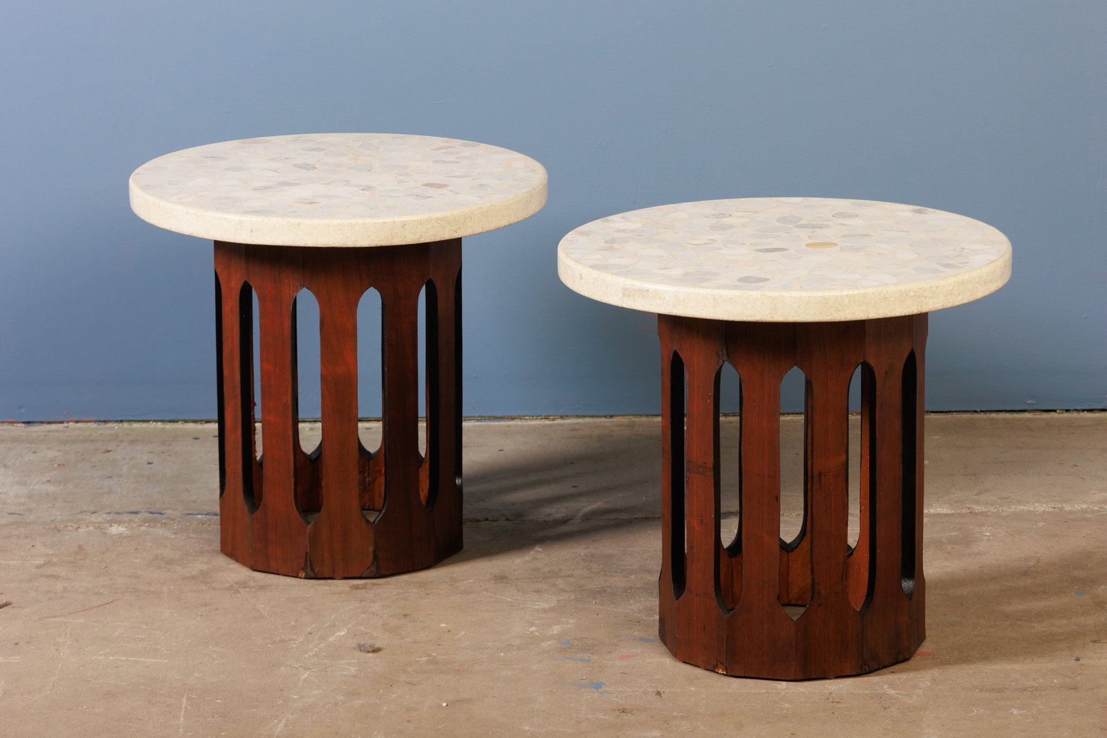 Harvey Probber, Side Tables (2): HARVEY PROBBER Pair of side tables, 1960s Terrazzo, walnut. Manufactured by Harvey Probber, USA. Each: 21" H x 22.5" Diameter