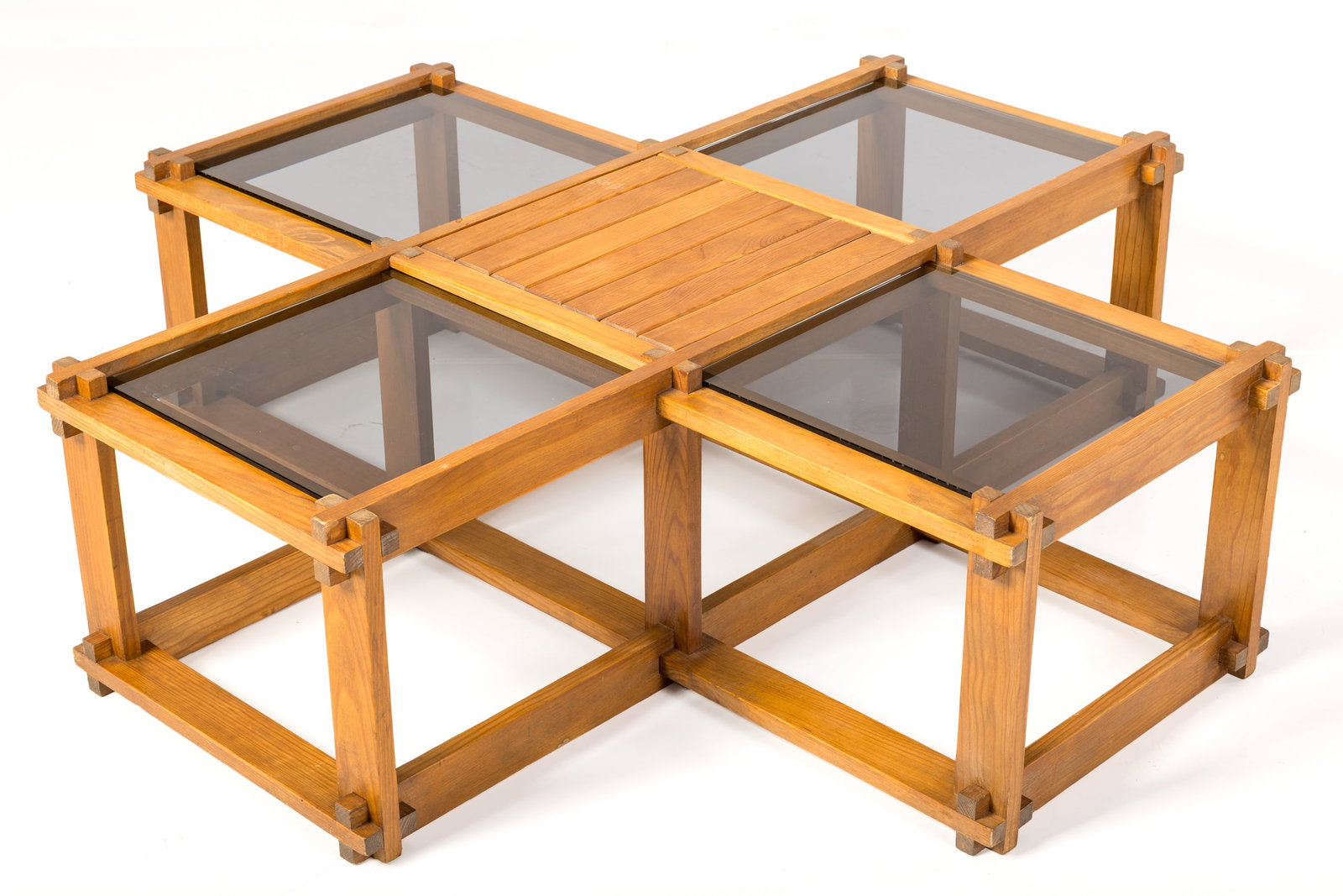 Constructivist, Coffee Table: CONSTRUCTIVIST Coffee table, 1970s Wood, smoked glass. 14" H x 48" W x 48" D