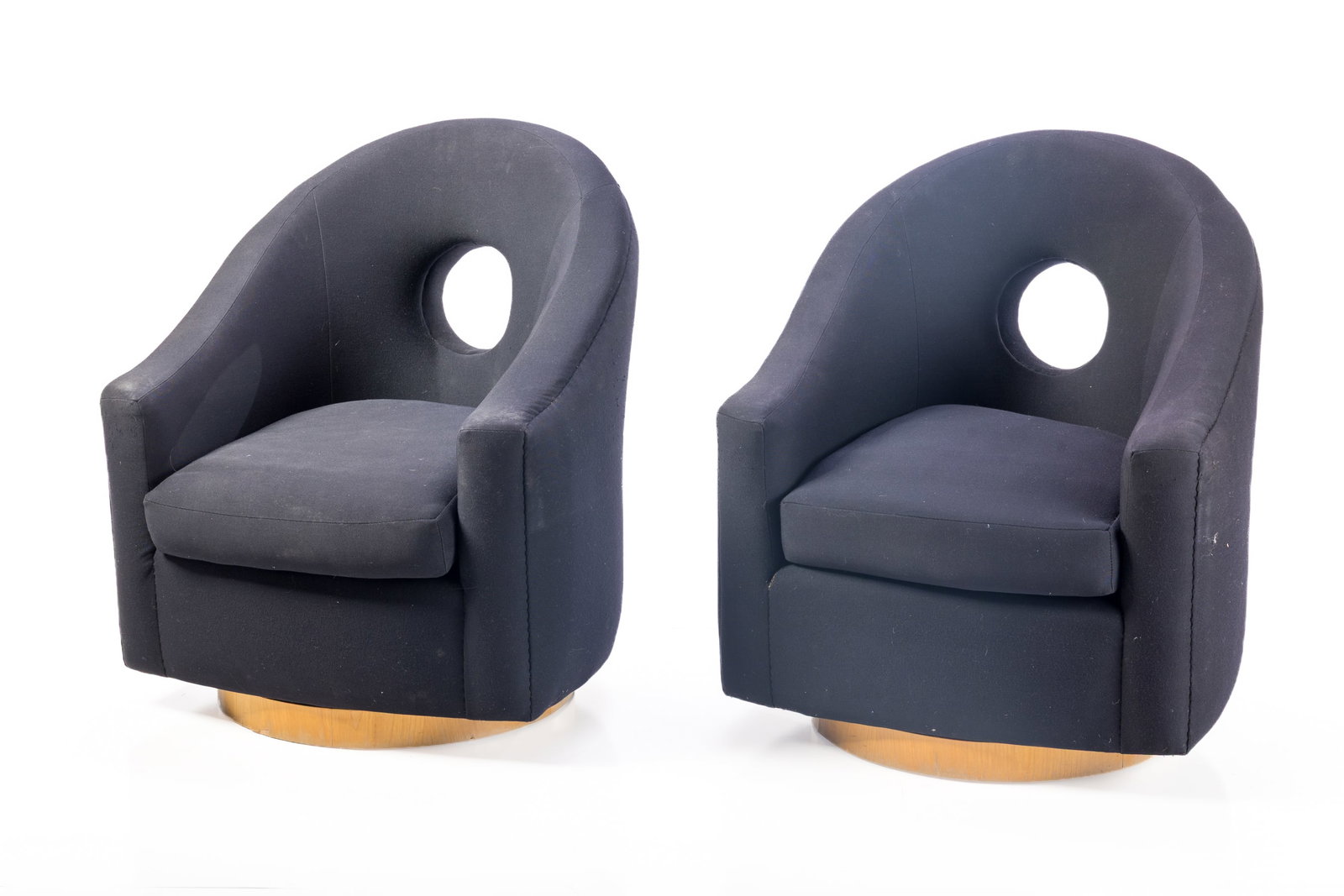 Roy McMakin, Custom Swivel Lounge Chairs (2): ROY MCMAKIN Pair of custom swiveling lounge chairs, 1990s Fabric, wood. Produced by Domestic Furniture Co., USA Each: 37.5" H x 30.5" W x 32" D Seat height: 16"