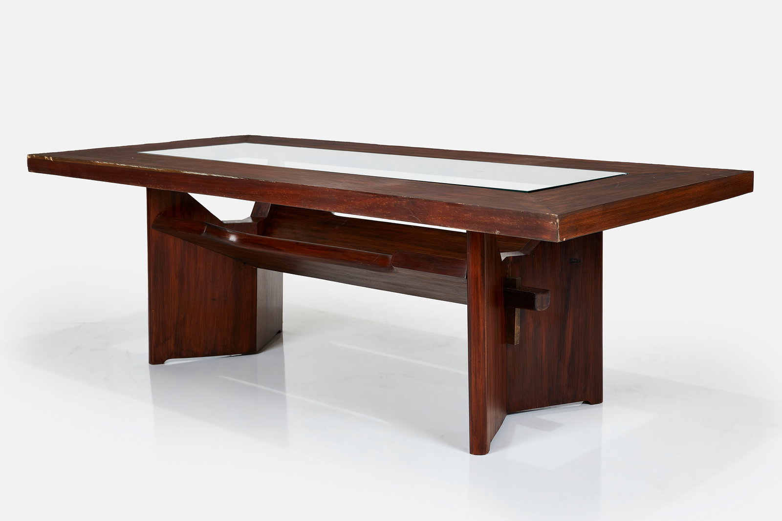 Jose Zanine Caldas, Rare Dining Table: JOSE ZANINE CALDAS Rare dining table, 1970s Pequi wood, glass. Made in Brazil. Branded signature to one leg. 28.75" H x 86.5" W x 41.25" D Provenance: Private Collec
