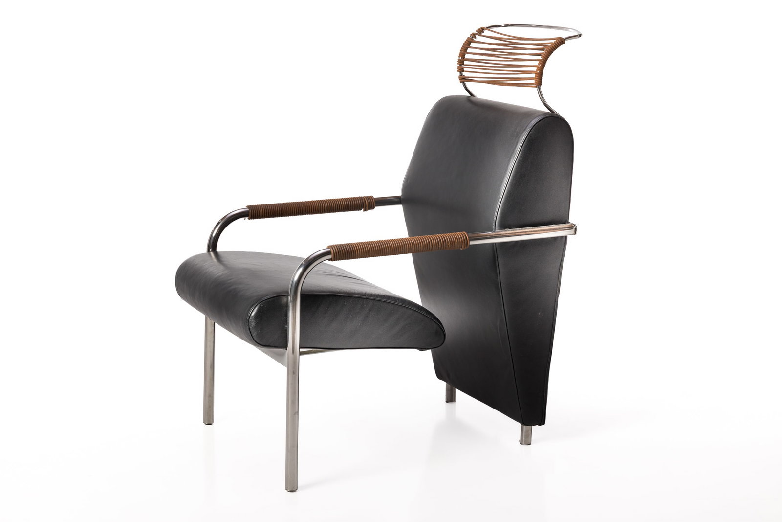 Andrea Branzi, 'Niccola' Lounge Chair: ANDREA BRANZI 'Niccola' lounge chair, ca. 1993 Leather, leather cord, chrome-plated tubular steel. Manufactured by Zanotta, Italy. Underside with manufacturer's tag and branded decking.