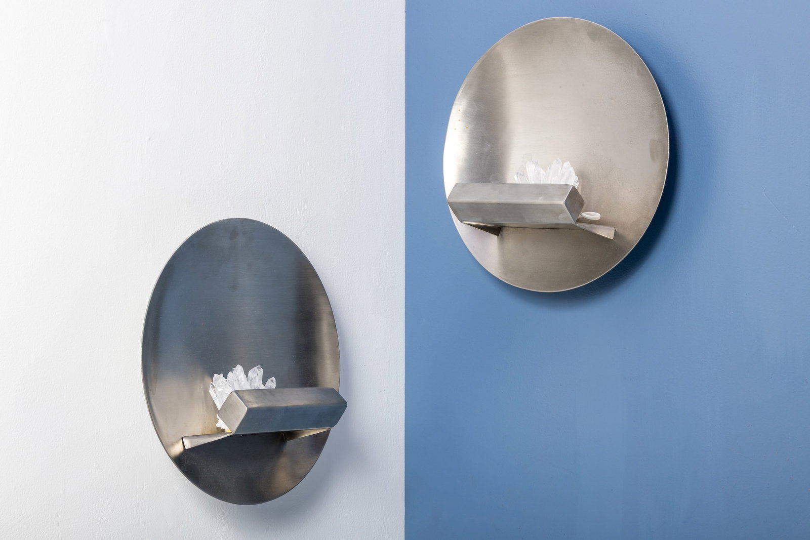 Maria Pergay Style, Sconces (2): MARIA PERGAY STYLE Pair of sconces, late 20th century Stainless steel, quartz. Each: 14" H x 14" W x 6" D