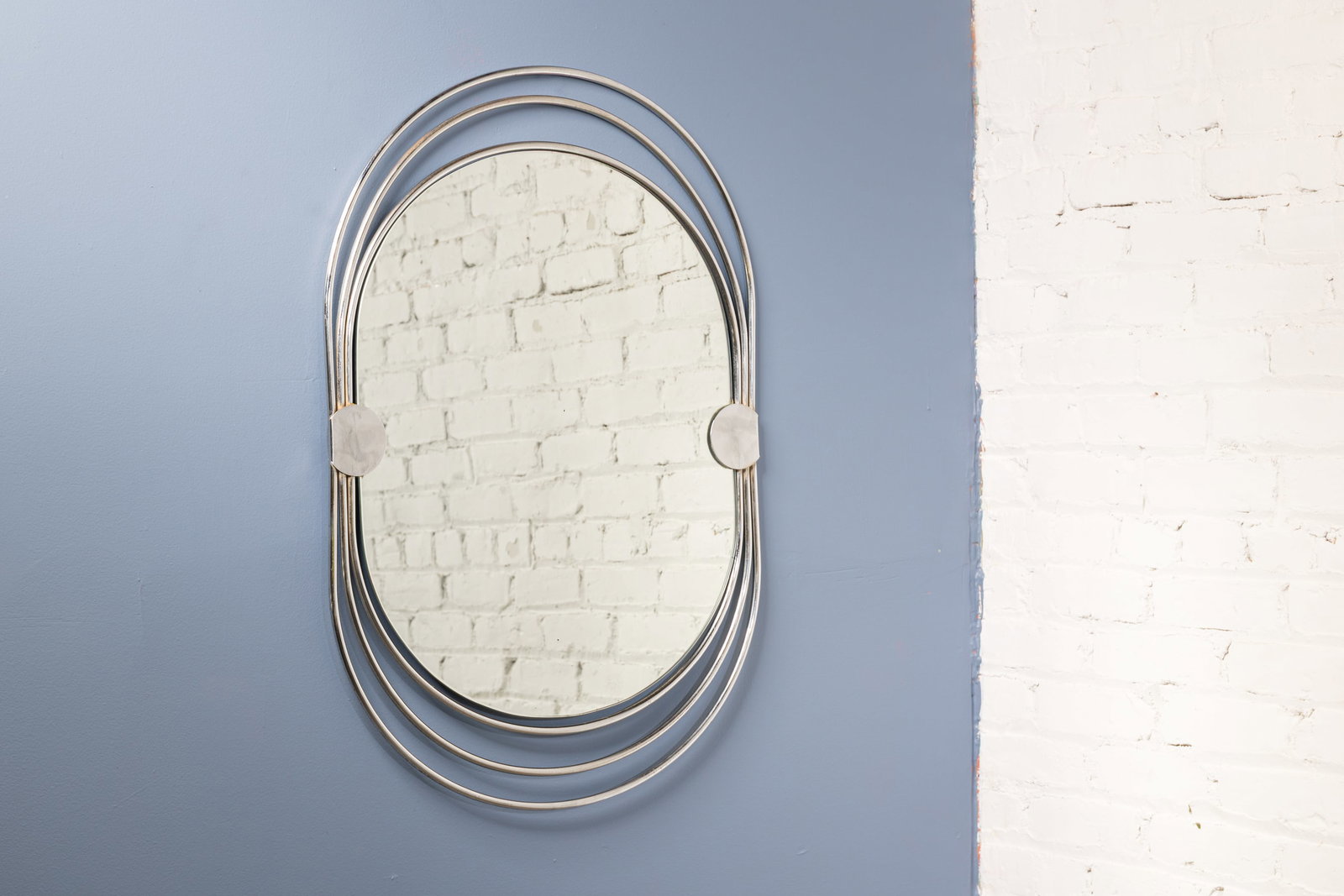 Italian, Wall Mirror: ITALIAN Wall mirror, 1980s Chrome-plated metal, mirrored glass. 33" H x 23" W x 0.5" D