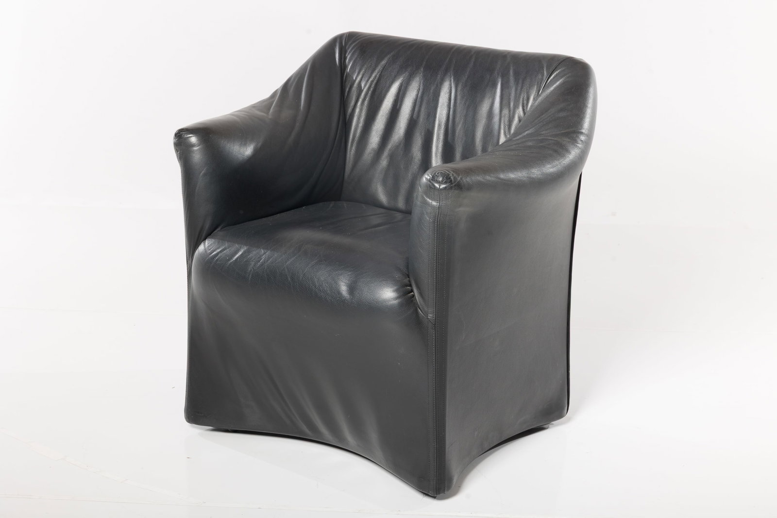 Mario Bellini, 'Piccola Tentazione' Chair: MARIO BELLINI 'Piccola Tentazione' armchair, model no. 684, ca. 1973 Leather, casters. Manufactured by Cassina, Italy. 33" H x 31.5" W x 27" D Seat height: 18"