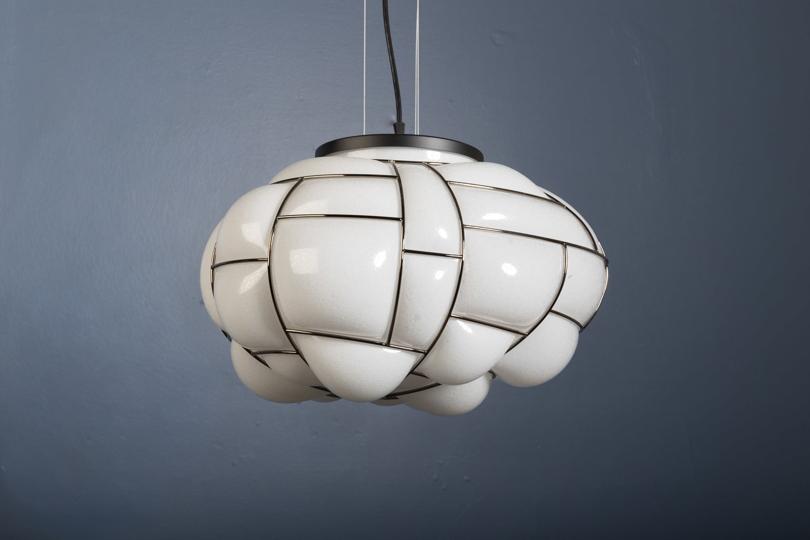 Enrico Franzolini, 'Egg' Pendant Lamp: ENRICO FRANZOLINI 'Egg' pendant lamp, 21st century Chrome-plated steel, opaque blown glass. Produced by Pallucco, Italy. Pendant only: 11.75" H x 19.5" W x 16.5"