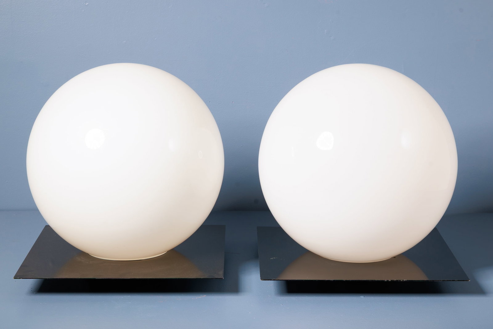 Sergio Mazza + Giuliana Gramigna, 'Micol' Lamps (2): SERGIO MAZZA + GIULIANA GRAMIGNA Pair of 'Micol' llamps, 1971 Opaline glass, enameled steel. Manufactured by Quattrifolio, Italy. Each: 21" H x 19.5" W x