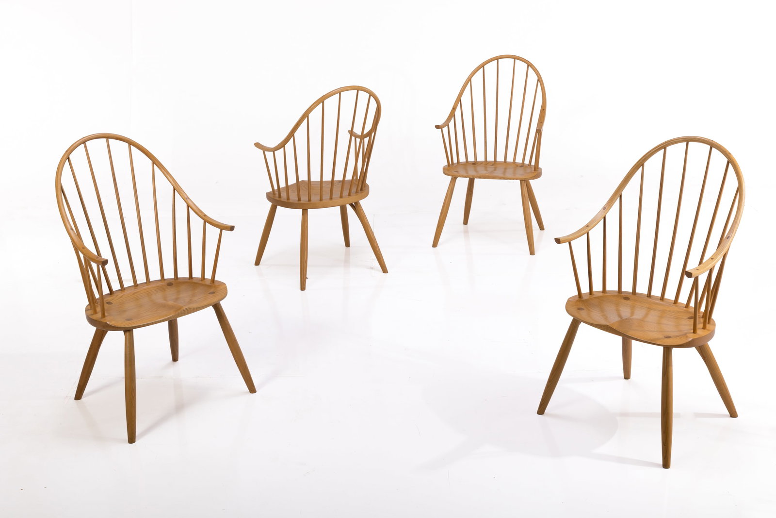 Leo Castonguay, Armchairs (4): LEO CASTONGUAY Set of four armchairs, 1985 Oak, beech. Studio-made. Undersides signed and dated. Each: 41" H x 23.25" W x 25" D Seat height: 17.5" Arm height: 27.75"