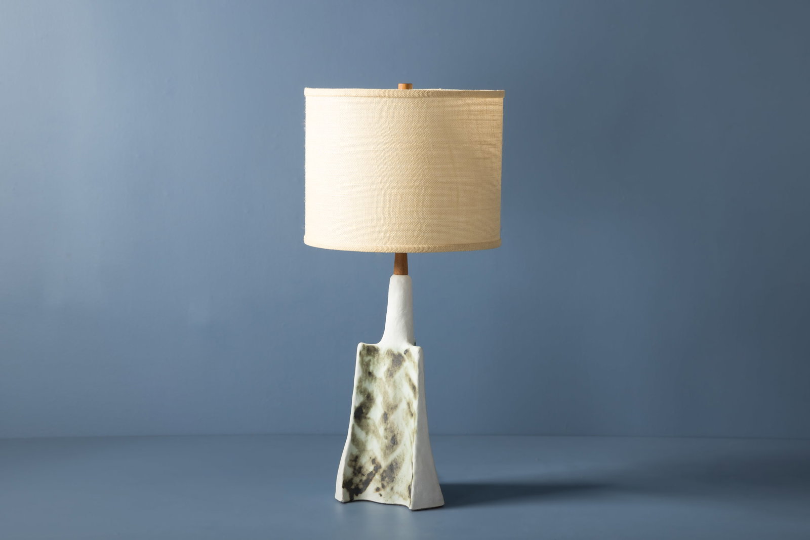 Gordon + Jane Martz, Table Lamp: GORDON + JANE MARTZ Table lamp, 1960s Glazed ceramic, burlap shade, teak finial. Produced by Marshall Studios, USA. Incised signature. Overall, including shade: 30" H x 14" Diameter Bas