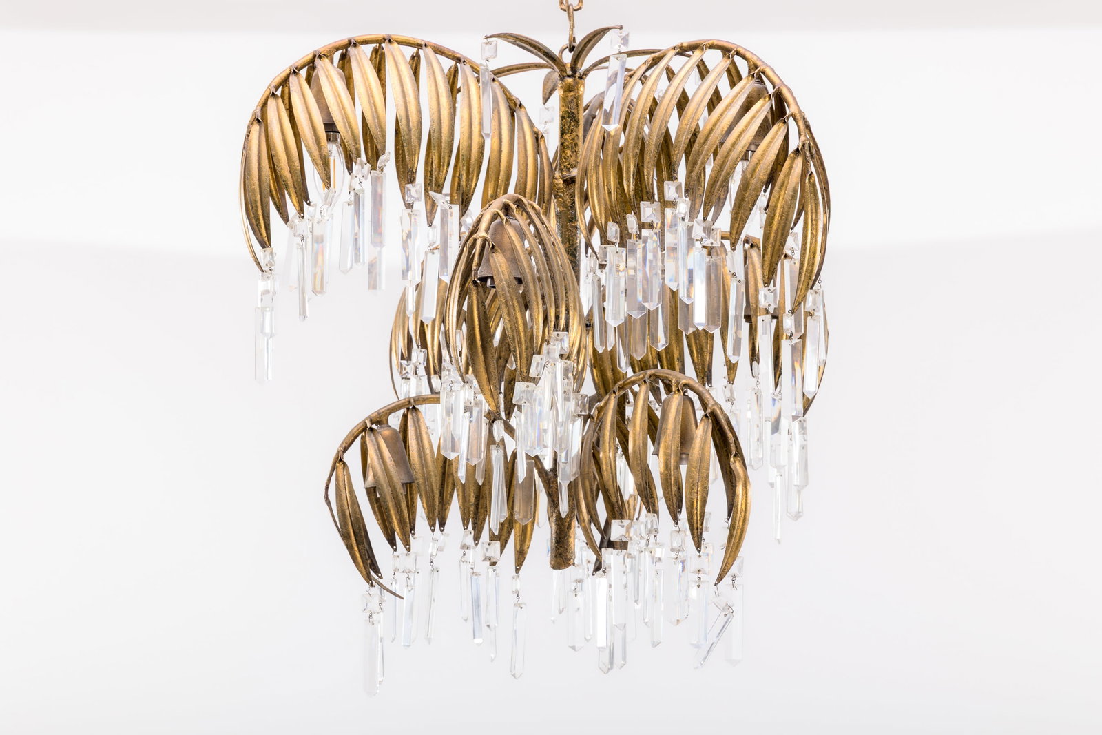 Hans Kogl, Palm Frond Chandelier: HANS KOGL Palm frond chandelier, 1940s Gilt metal, glass crystals, brass. Produced in Germany. 42" H x 24" W x 24" D